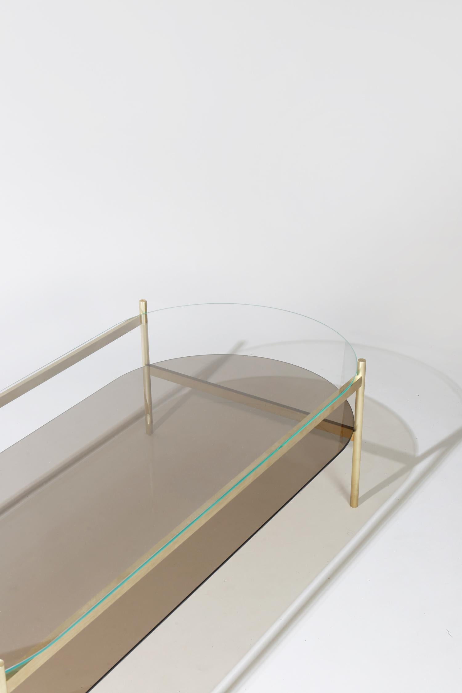 Made to order. Please allow 6 weeks for production.

Brass frame / clear glass / bronze glass

The Duotone coffee table is a commercial grade table made from precision machined solid brass. Each table is made locally in St. Augustine, Florida