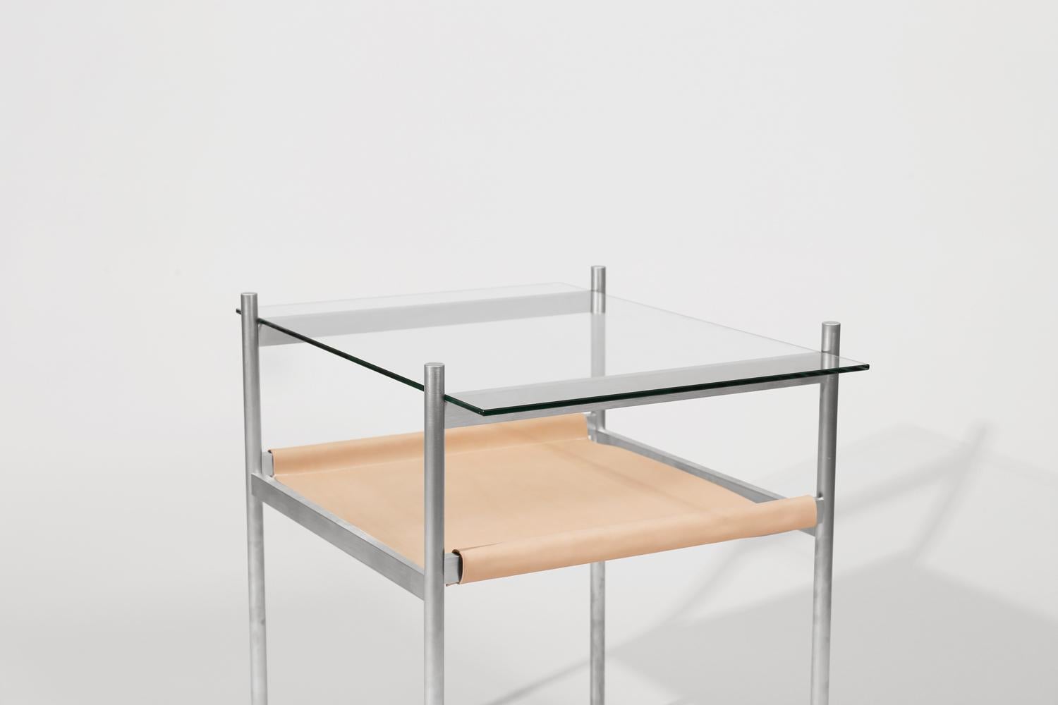 Made to order. Please allow six weeks for production.

Aluminum frame / clear glass / natural leather sling

The Duotone Furniture series is based on a modular hardware system that pairs sturdy construction with visual lightness and a range of