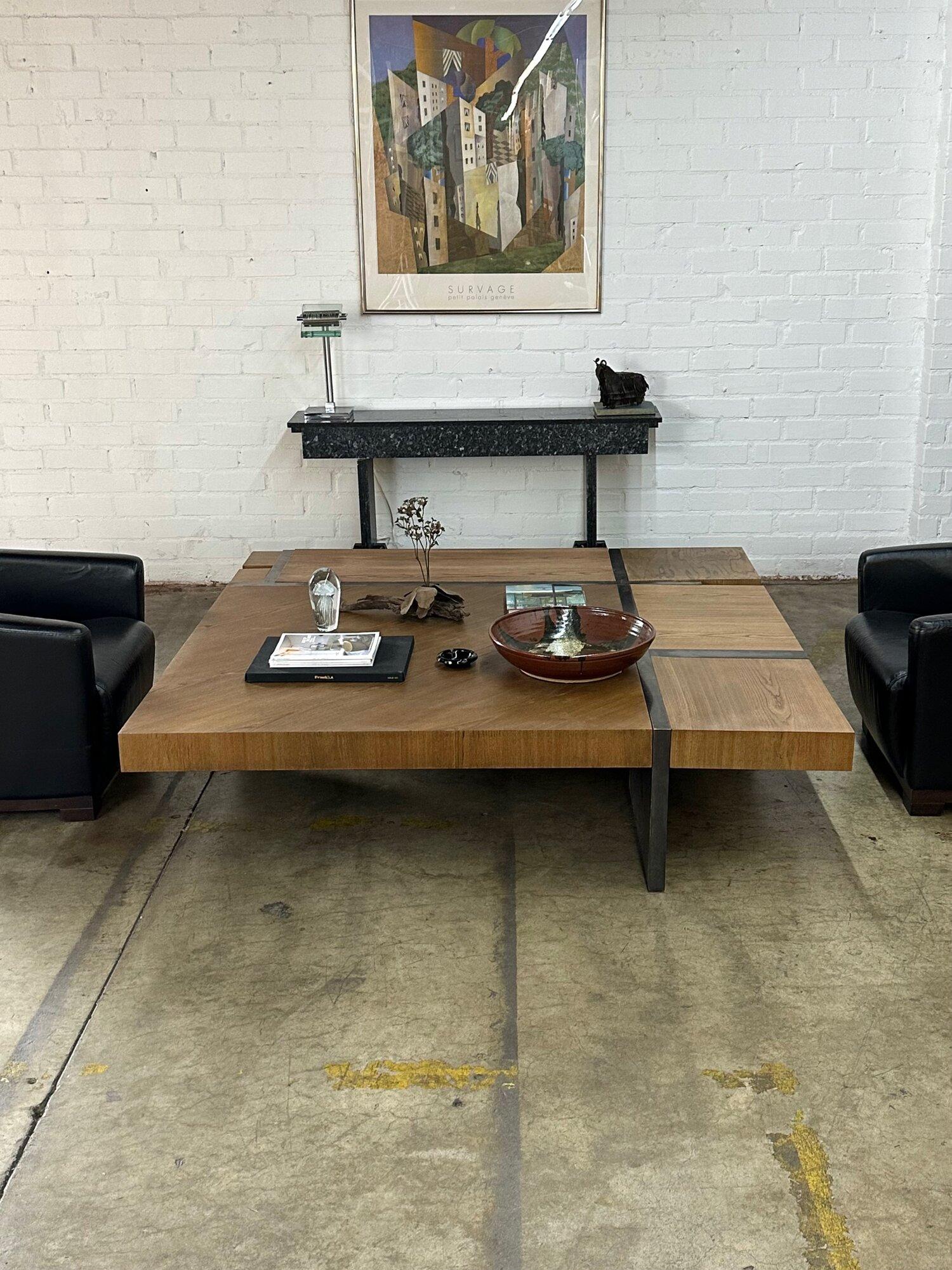 W70.25 D70 H17.5

Gently used variation of the Duplex Furniture by Hudson Furniture company in New York. Item has a solid metal frame that seems to be patinated bronze. Item has been refinished and does shows minor imperfections to wood but overall