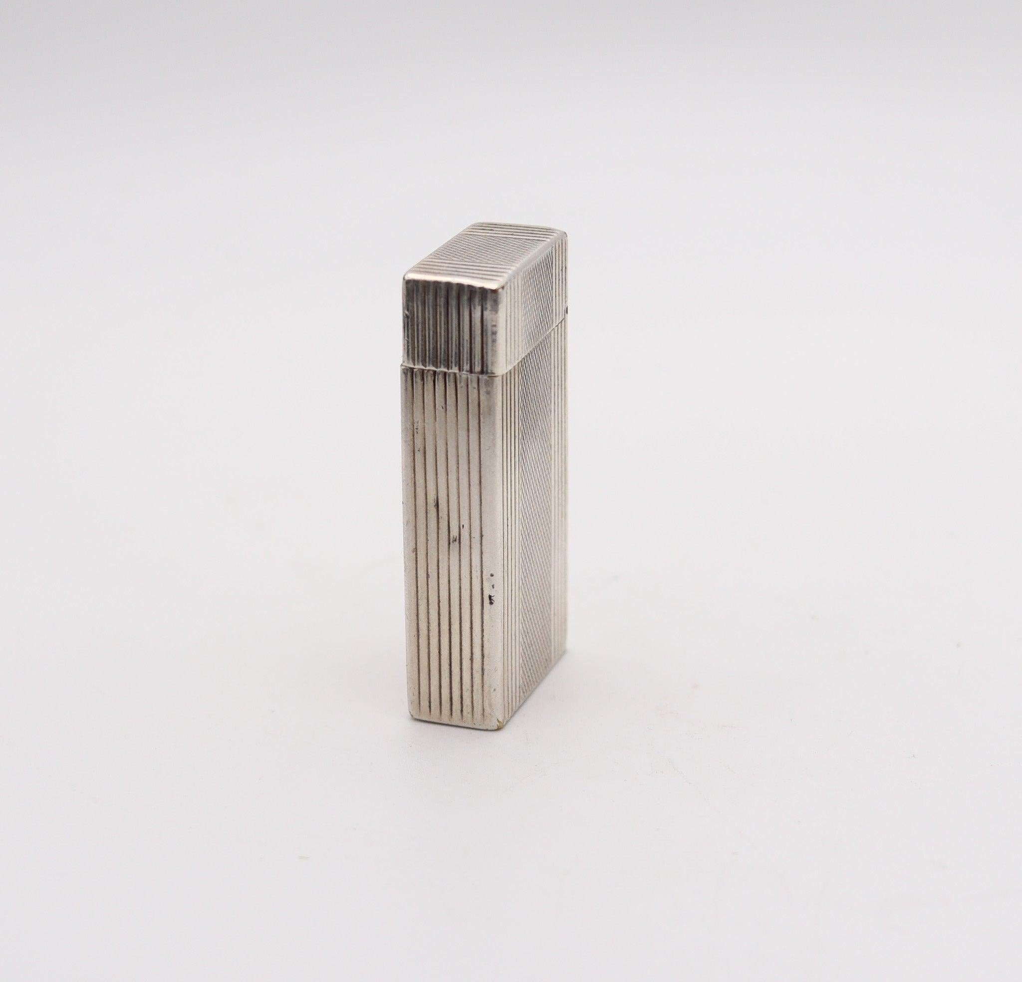 A Dupont roller petrol lighter made in France.

This is a very rare pocket petrol lighter created in Paris France during the post war period, back in the 1945. The lighter has been produced by the S.T. Dupont company in plated sterling with engine