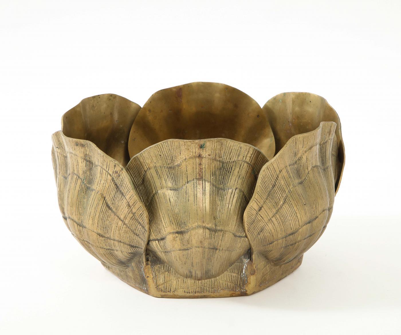 Mid Century Tony Duquette style planter/cach pot featuring 6 stylized shells in heavy bronze.