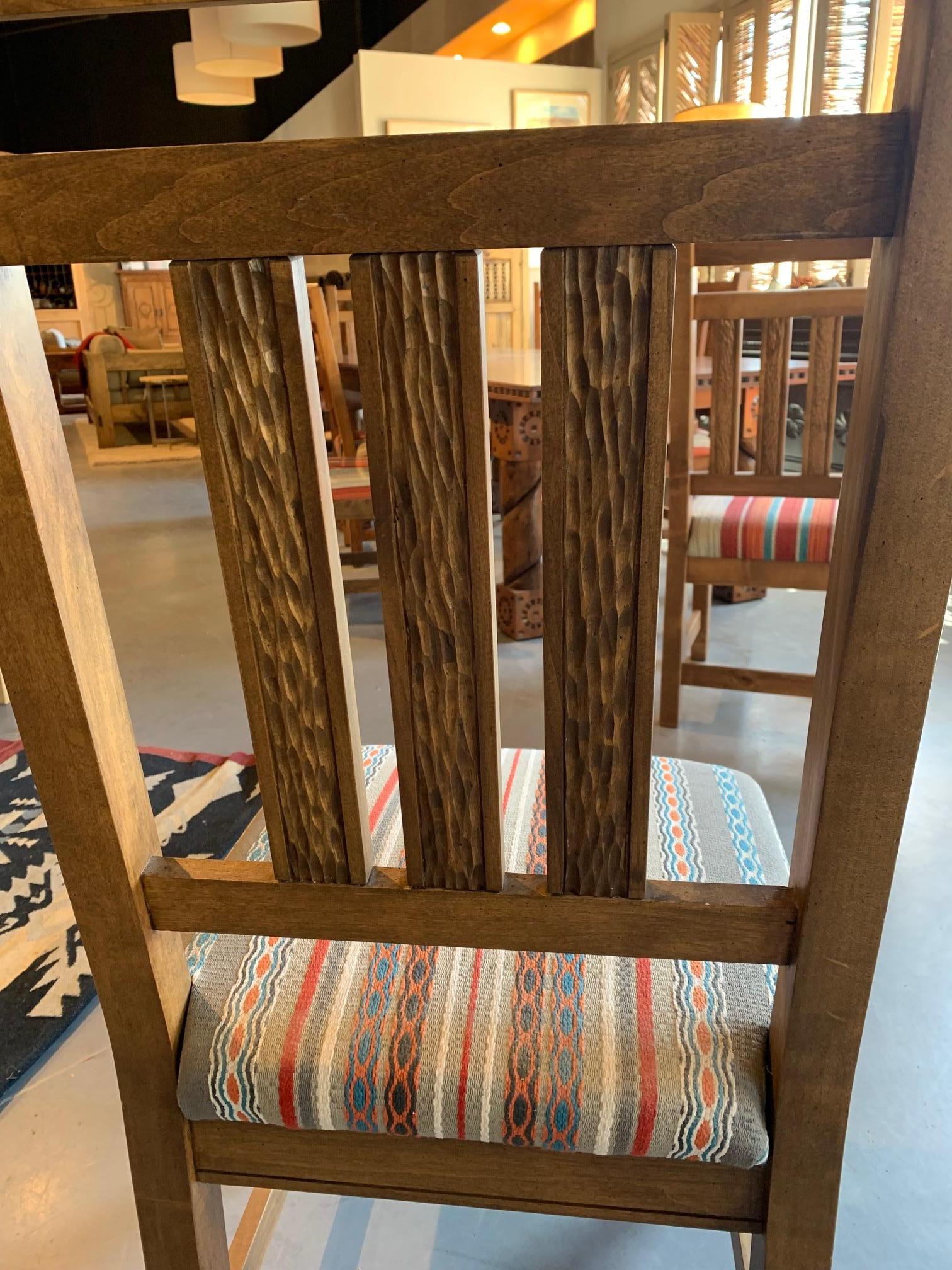 Beautiful Durango Chair. Chip carved with fun upholstery. Perfect for office or side in bedroom. Nice tall back.

This is a showroom floor model and does show some wear.