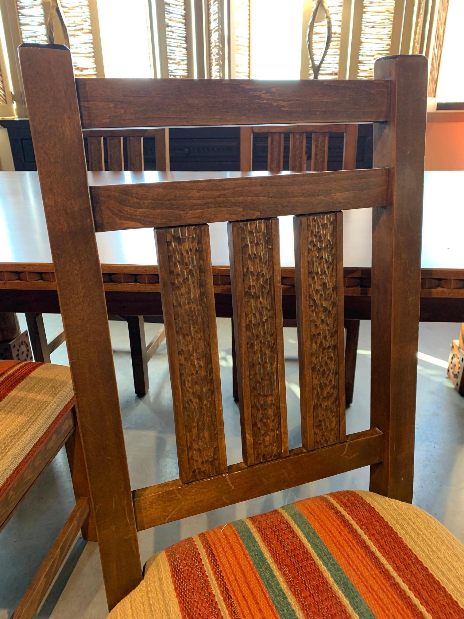 Beautiful set of 4 Durango Dining Chairs. Made in Fruitwood and chip carved. 
Matching Captain chairs complete the set and are sold on our storefront as well. 
These are showroom floor models and do show some wear.