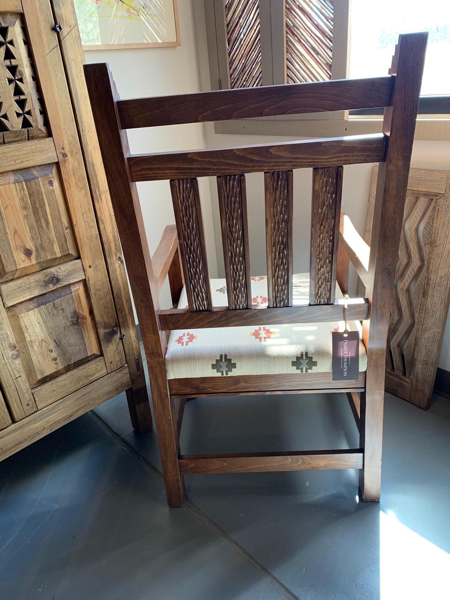 Carved Durango Sitting Arm Chair For Sale