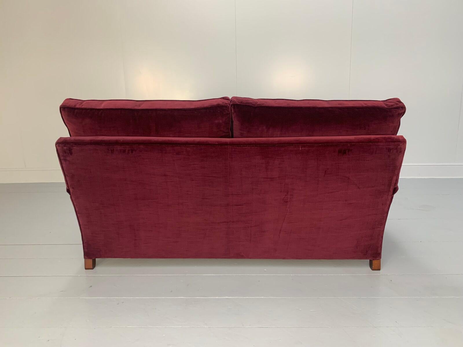 maroon velvet sofa