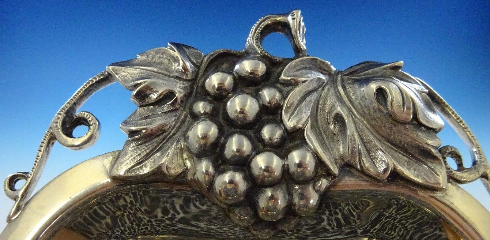 Wonderful Durham sterling silver serving platter with grapes and leaves motif. The piece is marked #495, it measures 1 5/8