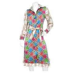 Duro Olowu Bright Flower Print Silk Long Sleeve Belted Button-Up Dress (Robe boutonnée à manches longues en soie imprimée de fleurs vives)