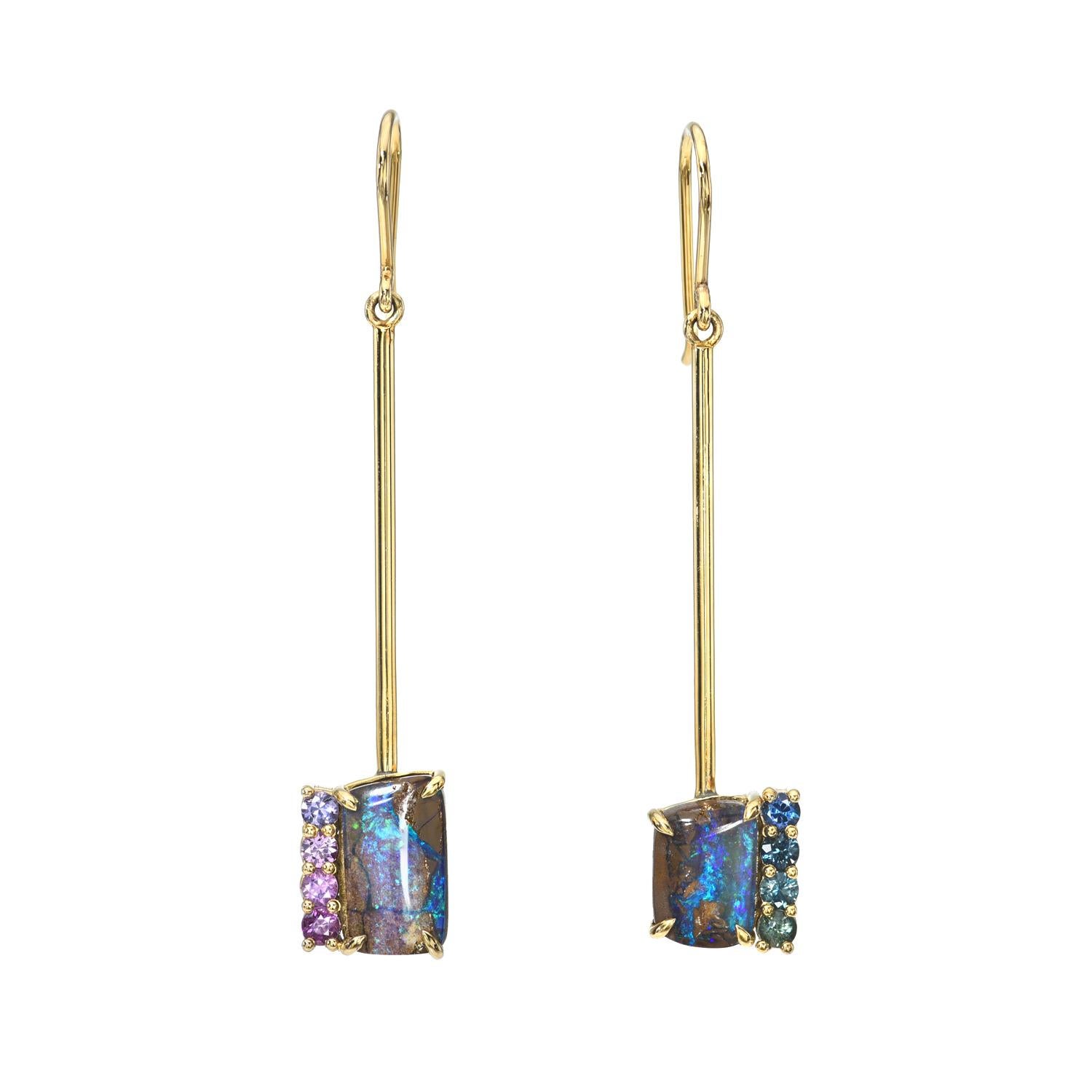 When day comes to a close, and night opens up, there is a palpable essence about; one hard to describe, more easily visualized.  The Dusk to Dreams Sapphire and Purple Opal Gold Drop Earrings embody this essence.  Two beautiful Australian Boulder