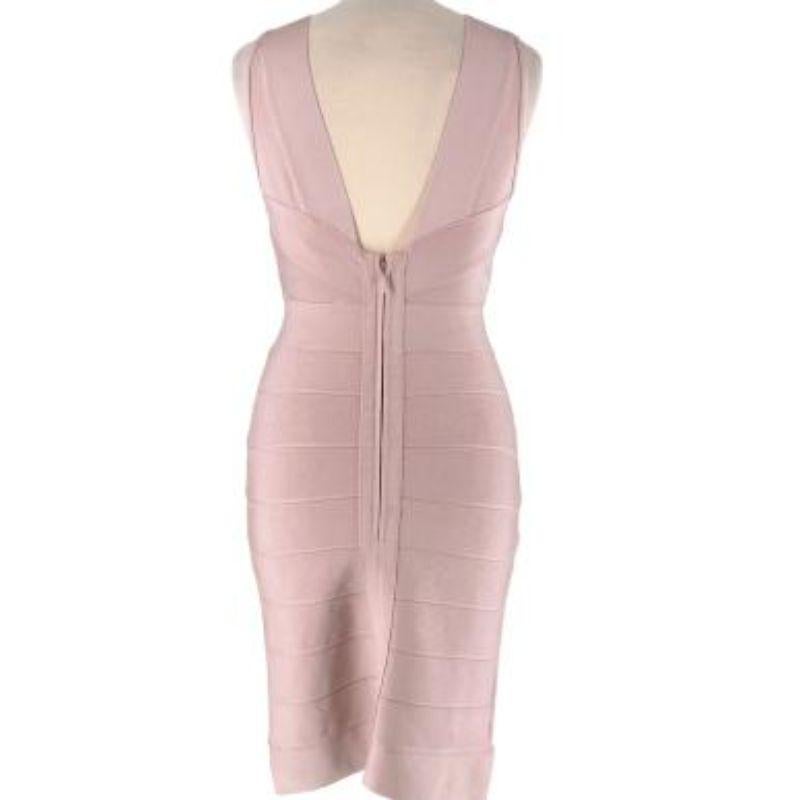 Herve Leger Dusky Pink Stretch Knit Bandage Dress
 
 - Mid weight, tight fitting body 
 - Knitted ribbed detail 
 - Deep V neckline 
 - Thick shoulder straps
 - Concealed back zip fastening 
 - Warm dusky pink hue
 
 Materials:
 86% Rayon
 13% Nylon