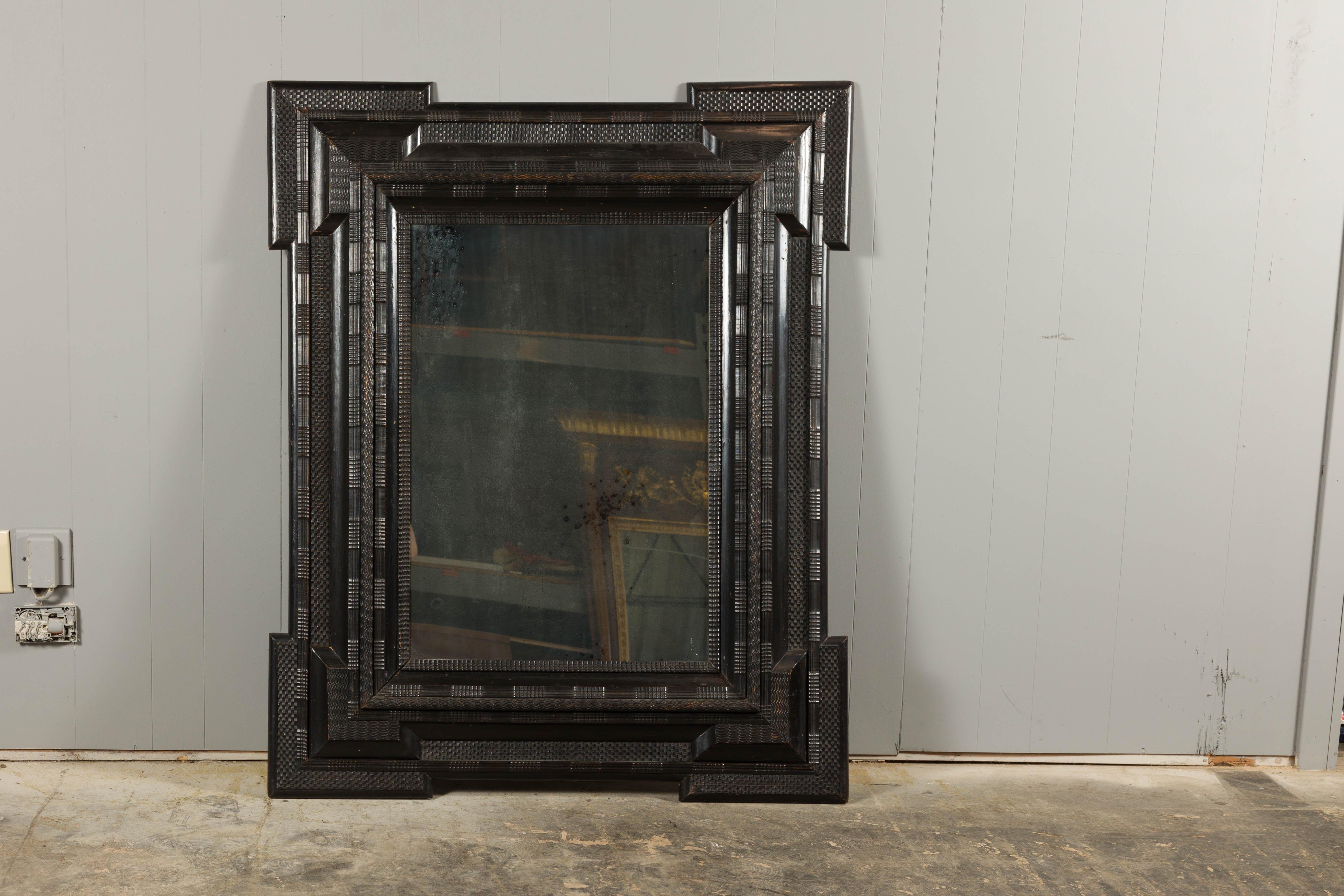 18th Century and Earlier Dutch 18th Century Dark Brown Carved Wooden Mirror with Protruding Corners For Sale