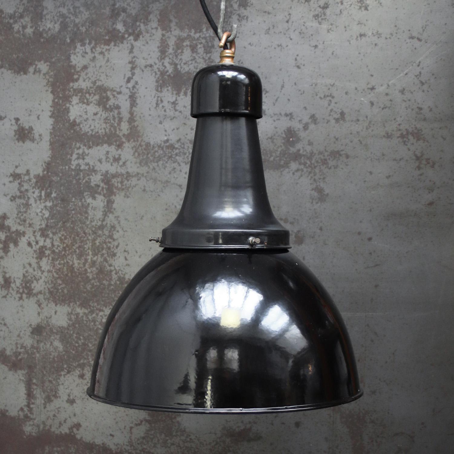 1920s Rare Dutch vintage factory Pendant light.
Black enamel, white interior

Weight: 3.00 kg / 6.6 lb

Priced per individual item. All lamps have been made suitable by international standards for incandescent light bulbs, energy-efficient and LED