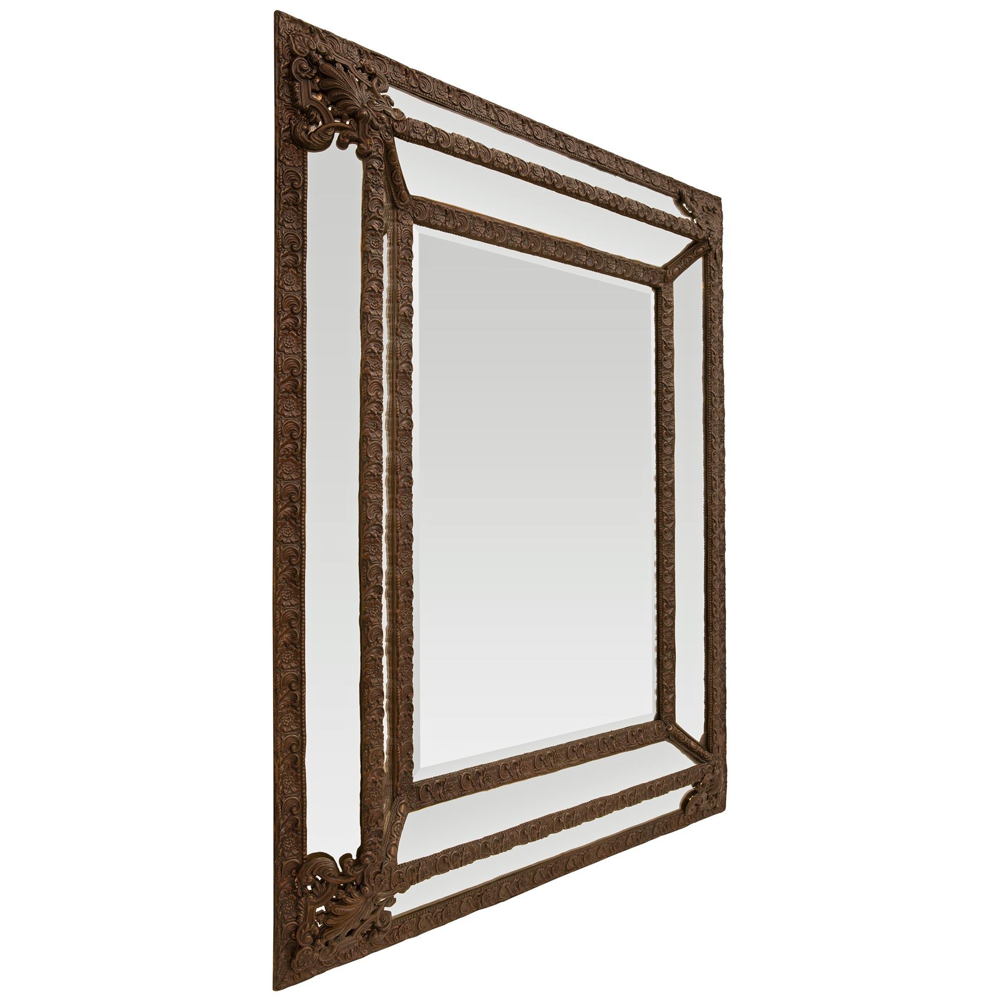 Dutch 19th Century Baroque St. Patinated Pressed Metal Double Framed Mirror In Good Condition For Sale In West Palm Beach, FL
