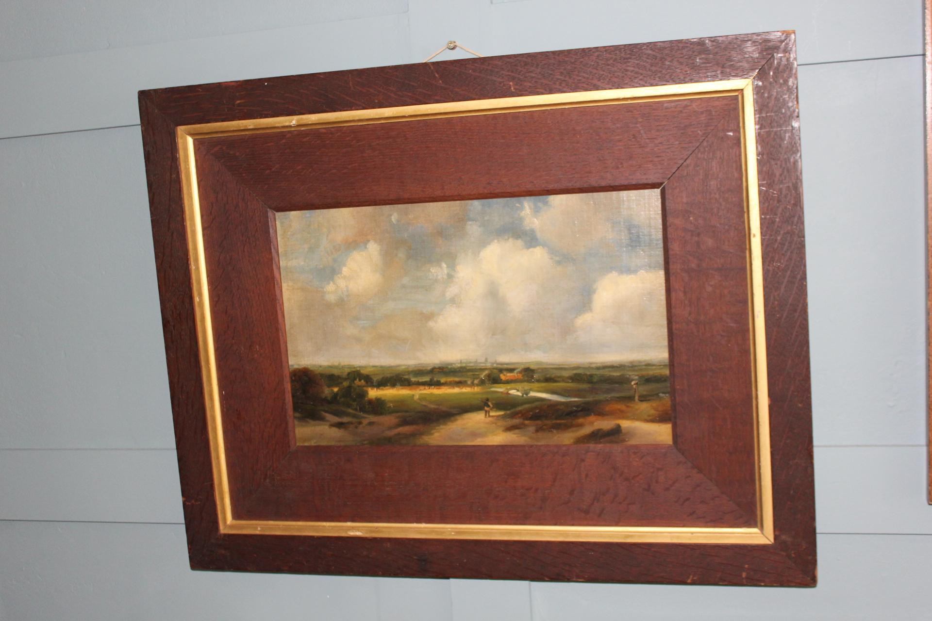 This charming oil-on-paper painting captures a serene landscape near Haarlem, evocative of Andreas Schelfhout's masterful Dutch Romantic style. The work features a quintessentially Dutch scene with expansive skies, tranquil waterways, and lush