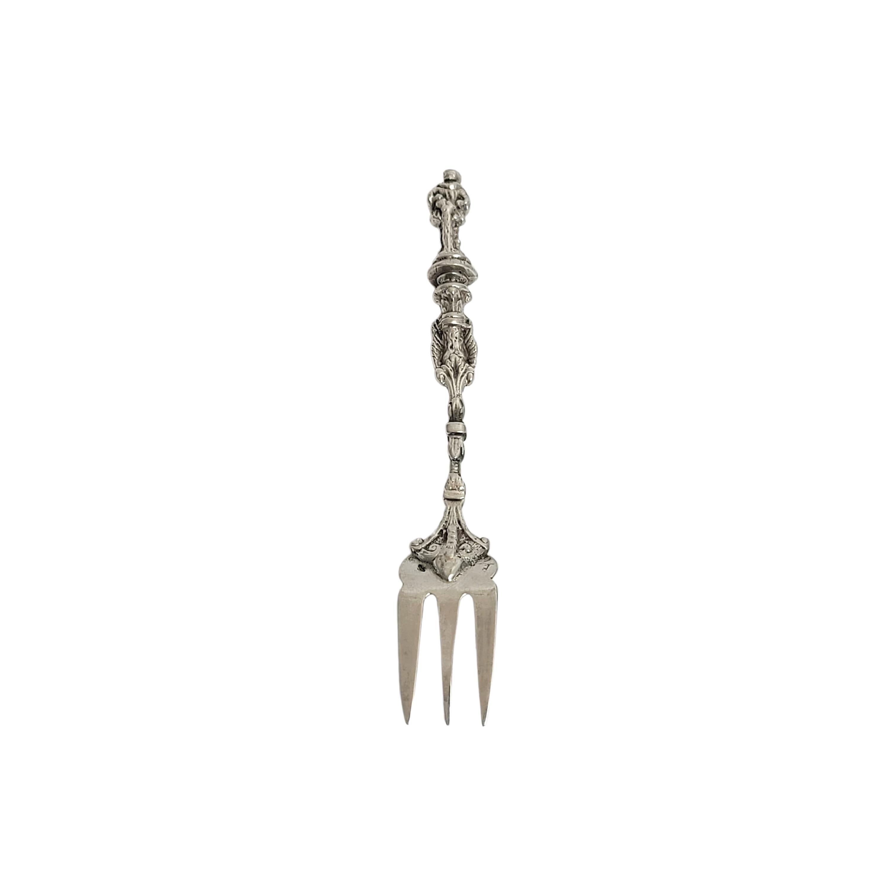 Dutch 833 silver figural fork, circa 1814-1905.

Small fork featuring a Dutch man atop the ornate handle.

Measures approx 4 1/2