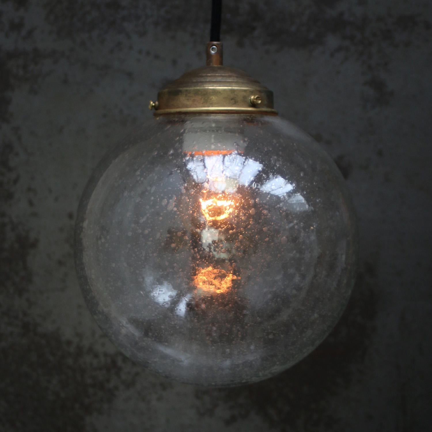 Original vintage air bubble glass pendant.
2 meter black wire
Brass top

Weight: 2.00 kg / 4.4 lb

Priced per individual item. All lamps have been made suitable by international standards for incandescent light bulbs, energy-efficient and LED bulbs.