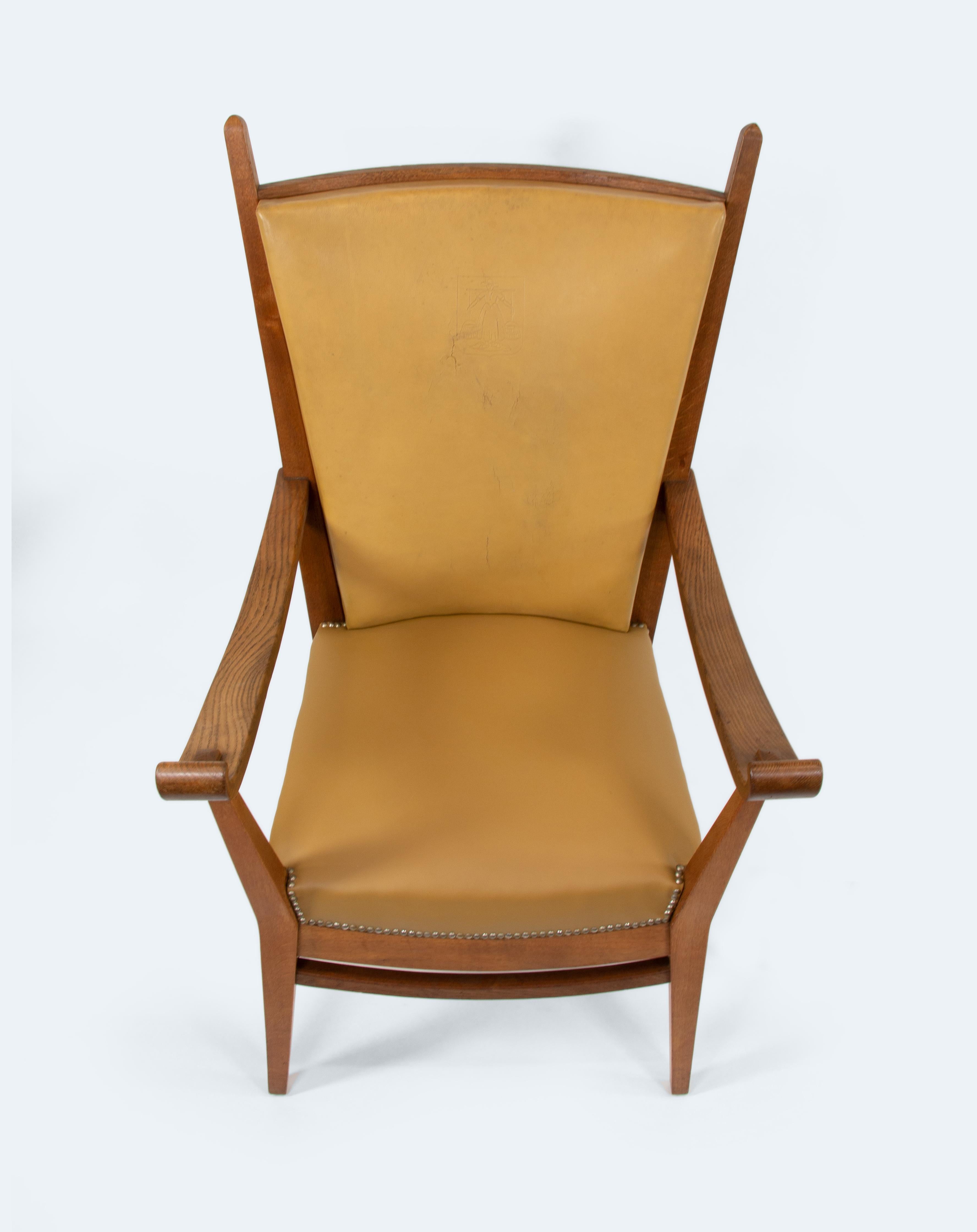 This commanding armchair, designed by Bas van Pelt, embodies the refined elegance that defines his contributions to Dutch modernism. Crafted from solid oak and featuring spring core upholstery, it is upholstered in luxurious beige leather, with