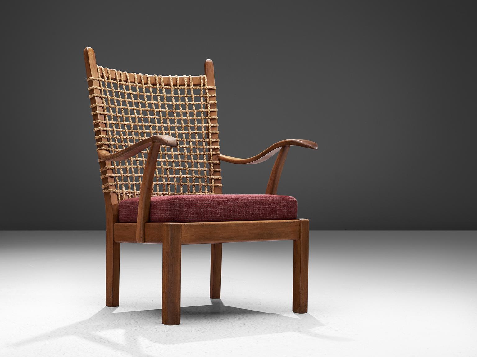 Dutch armchair, oak and cane, the Netherlands, 1940s.

This robust Dutch chair originates from the late 1940s. The seat is make of oak and back is made of woven cane.. This natural, robust style is typical for design of the 1940s by Bas van Pelt,