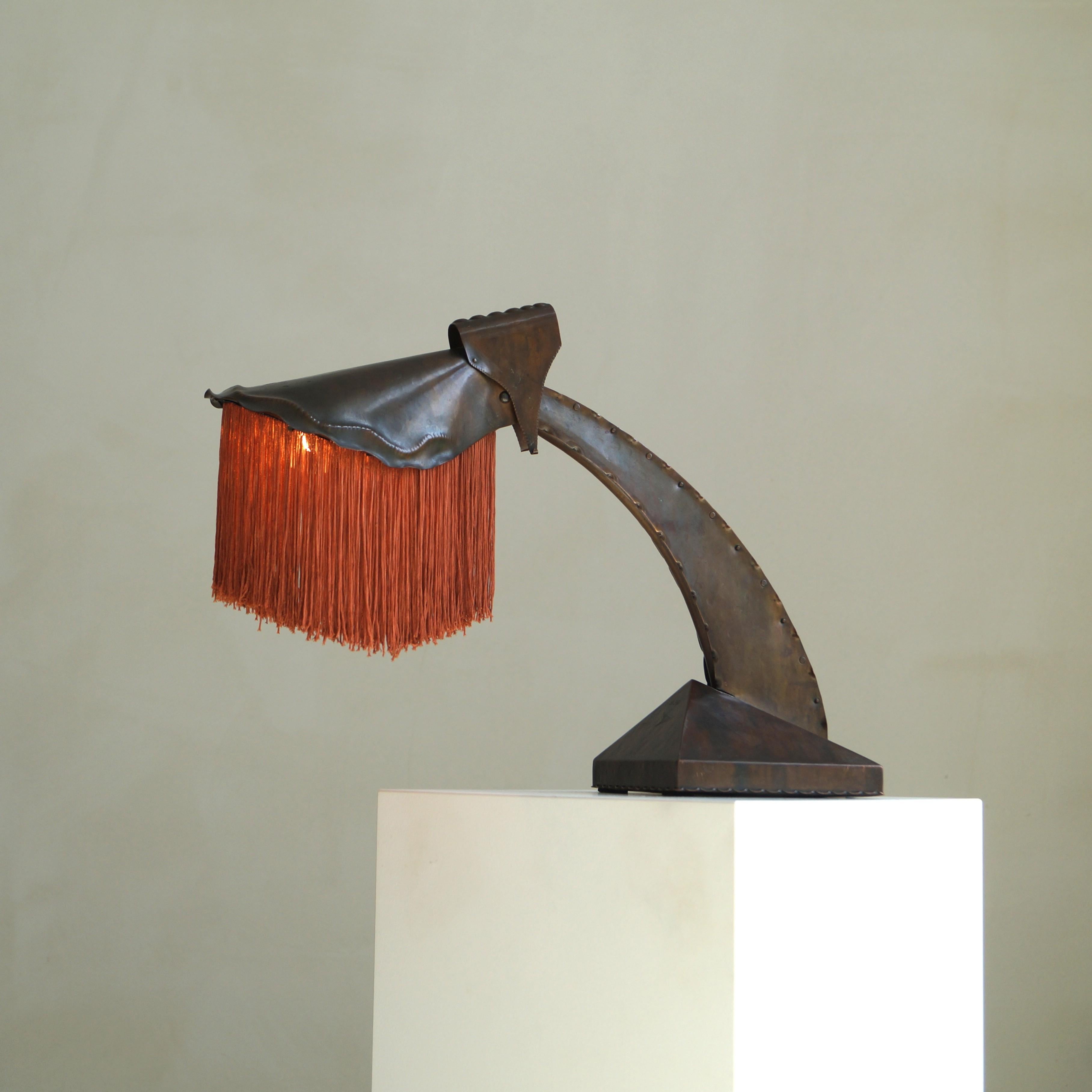 An exceptionally rare, signed Conrad Fehn Amsterdam School desk lamp - identical to the example featured in the famous reference work 'Living in the Amsterdam School' (see in the video) 

This book comes with the lamp. 

This striking design, with