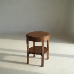 Tavolino rotondo della Scuola di Amsterdam in stile Art Déco olandese con dettagli scultorei, anni '20