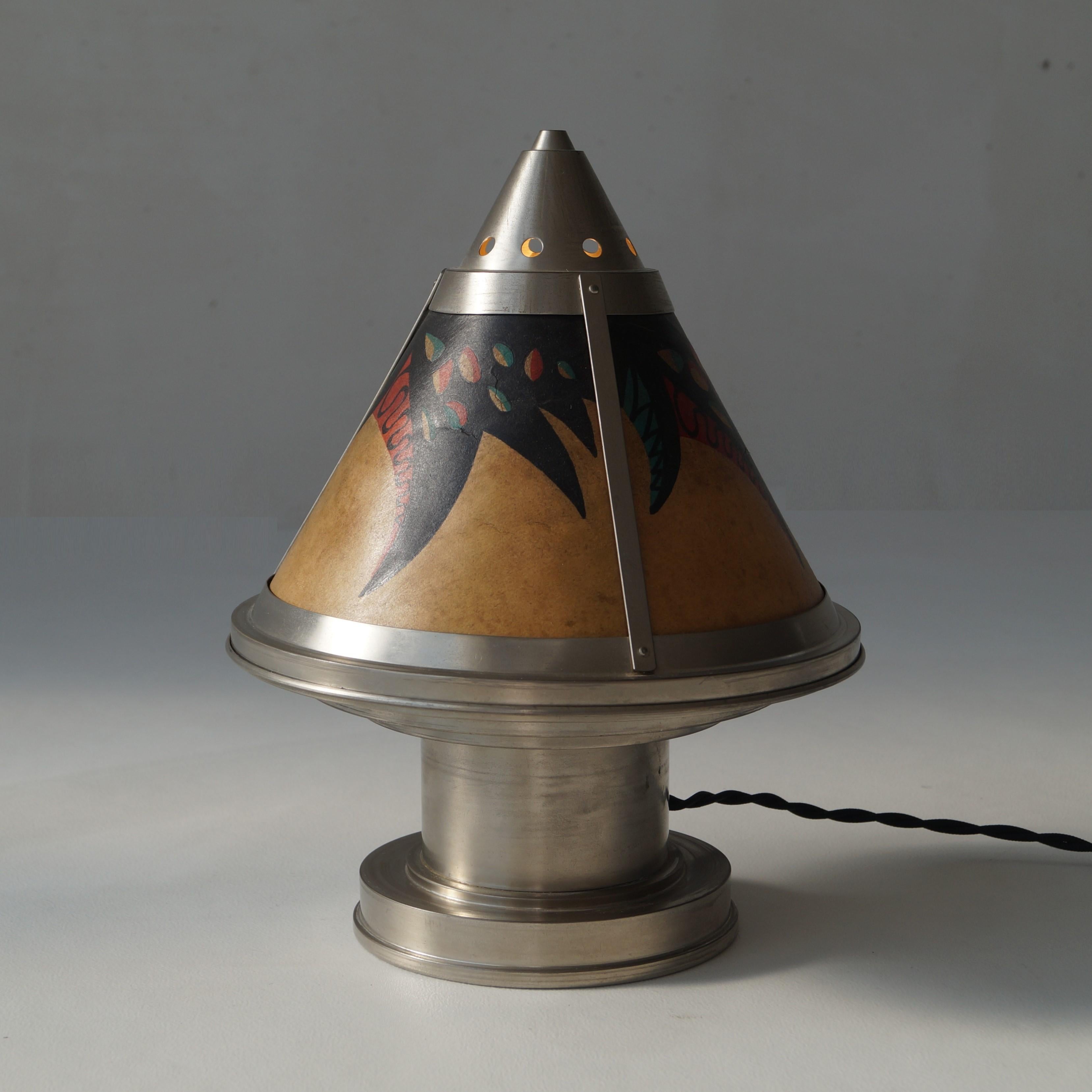 A rare Dutch Art Deco table lamp or bedside light by Dutch manufacturer Daalderop, c. 1925. The piece is in excellent condition regarding its age. These lamps were produced in brass and nickel plate. This one is the nickel version.

The lampshade is