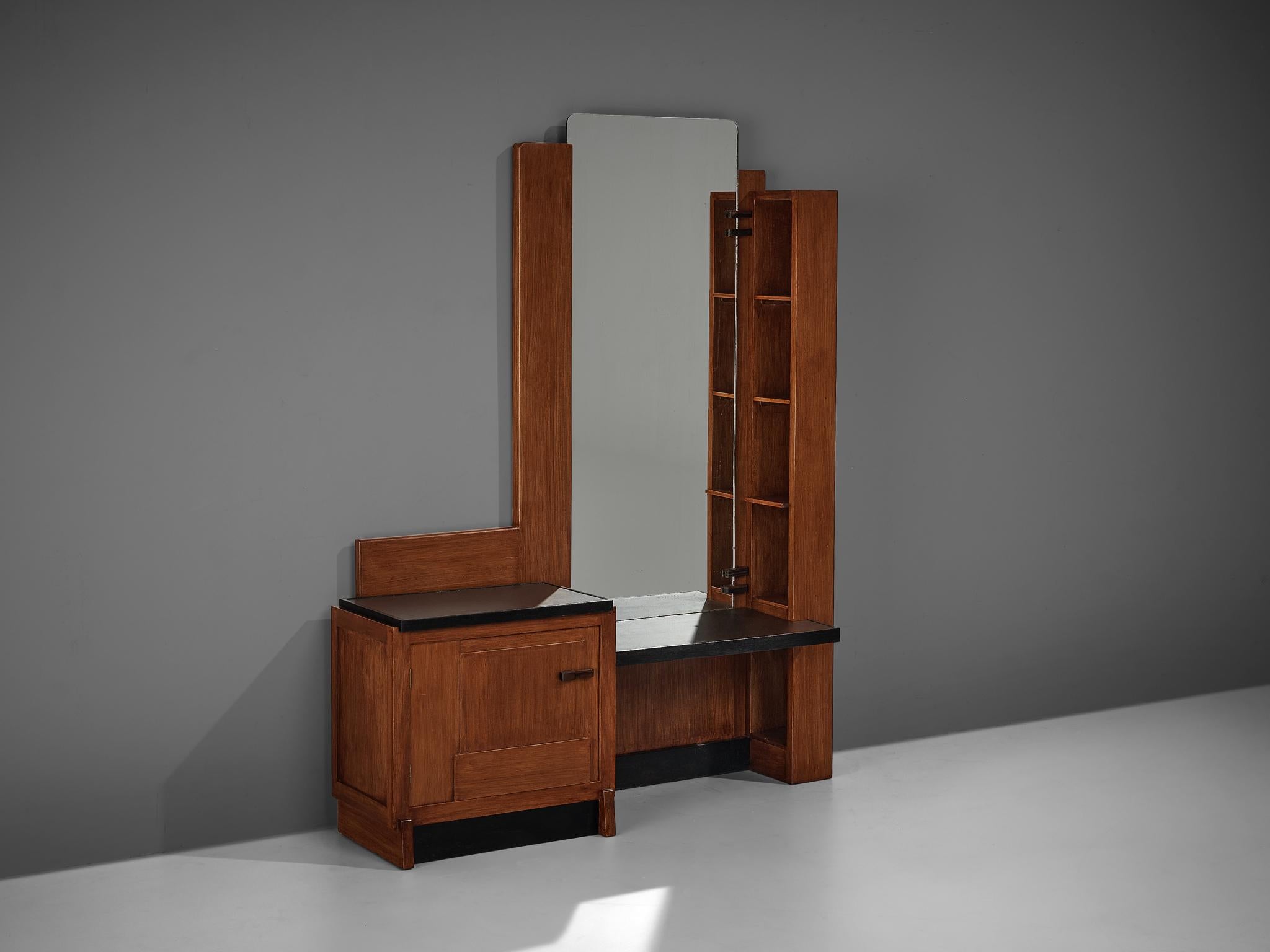 Attributed to Jan Brunott, dressing table, macassar ebony, mahogany, glass, The Netherlands, circa 1925
 
A large mirror combined with functional storage space and beautiful forms make this dressing table a remarkable design. Designed circa 1925 and