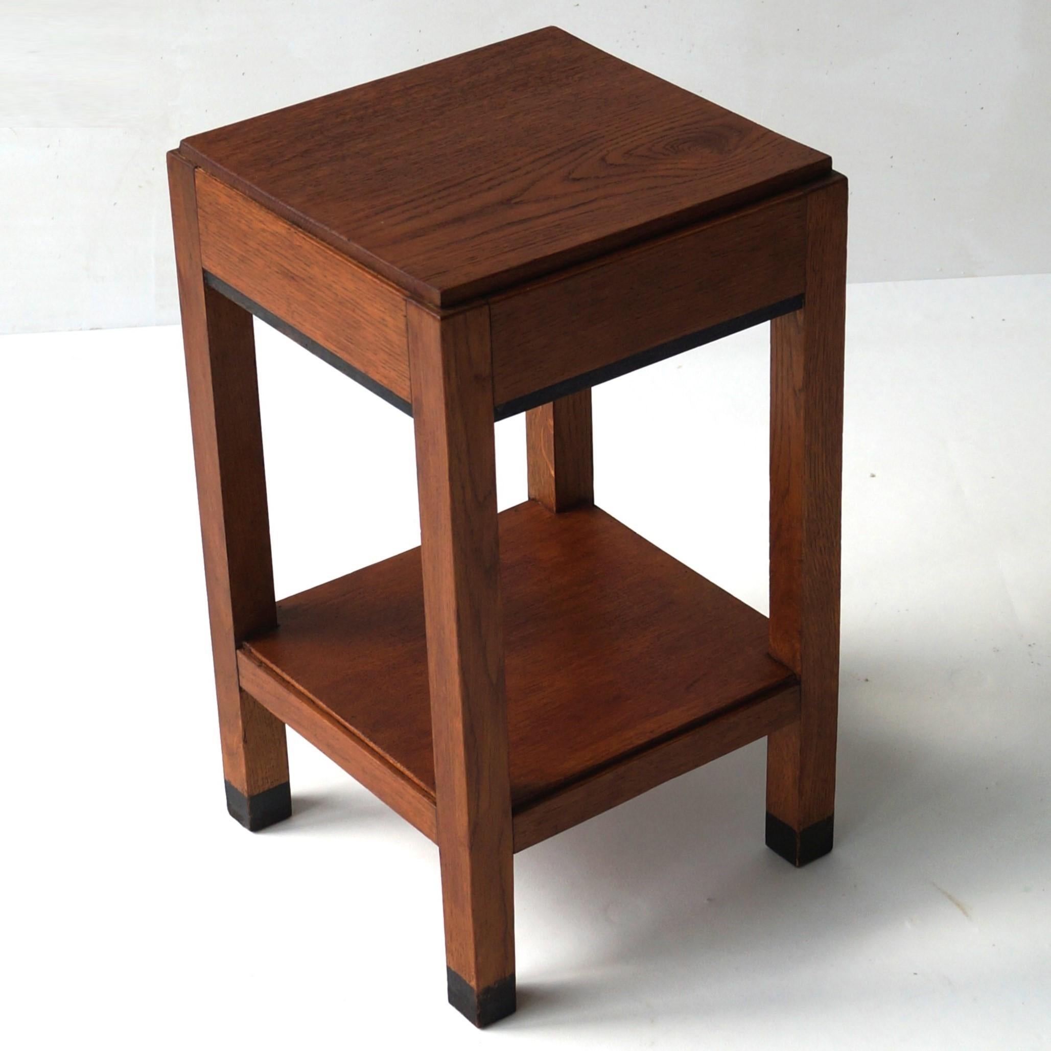 A small Dutch side table, typically Haagse School (The Hague School), 1920s. This table will fit in very well with other pieces in the same style and is ideal as a display table for a sculpture or a plant. The piece is made of solid oak and has