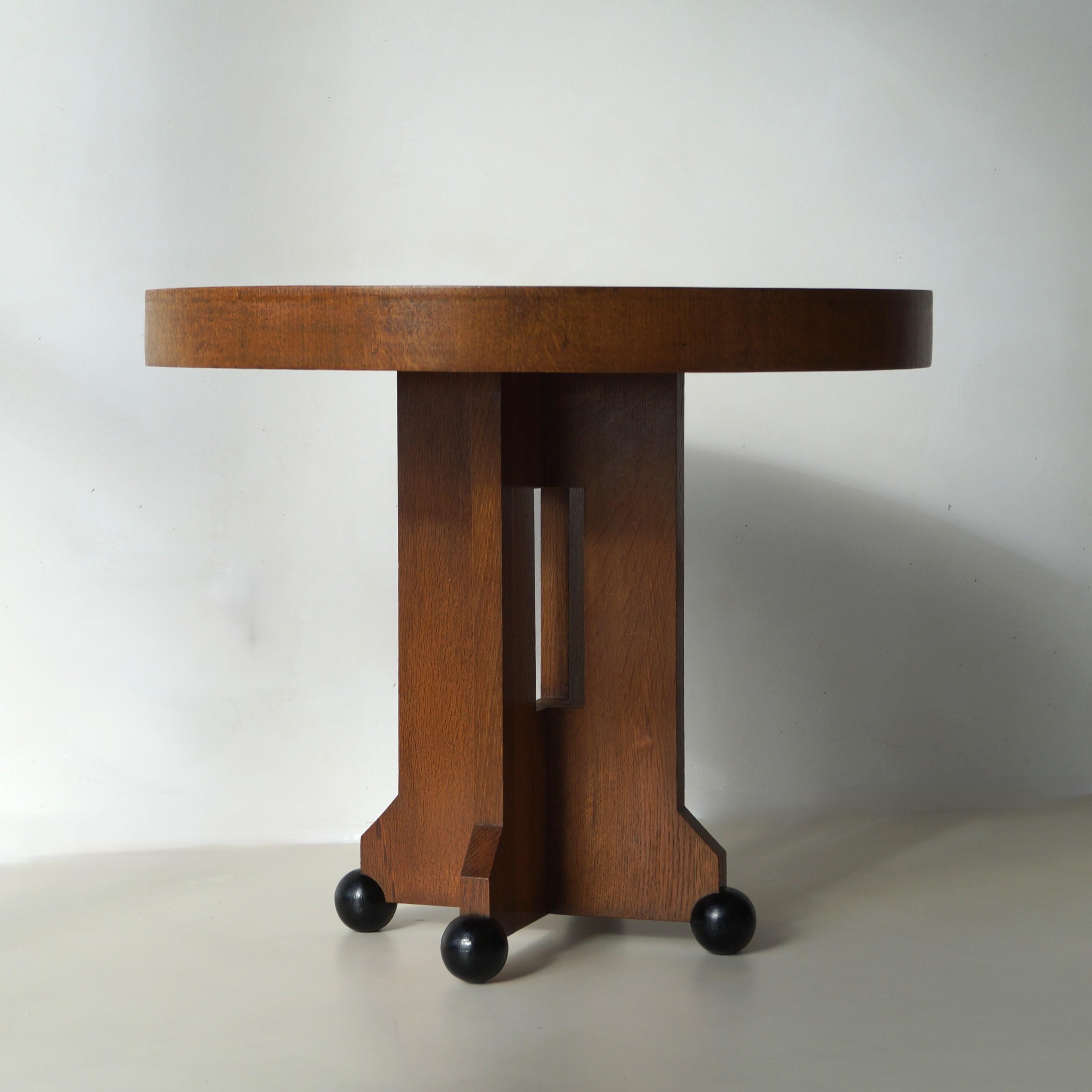 Hand-Crafted Dutch Art Deco modernist coffee table on ball feet, 1920s For Sale