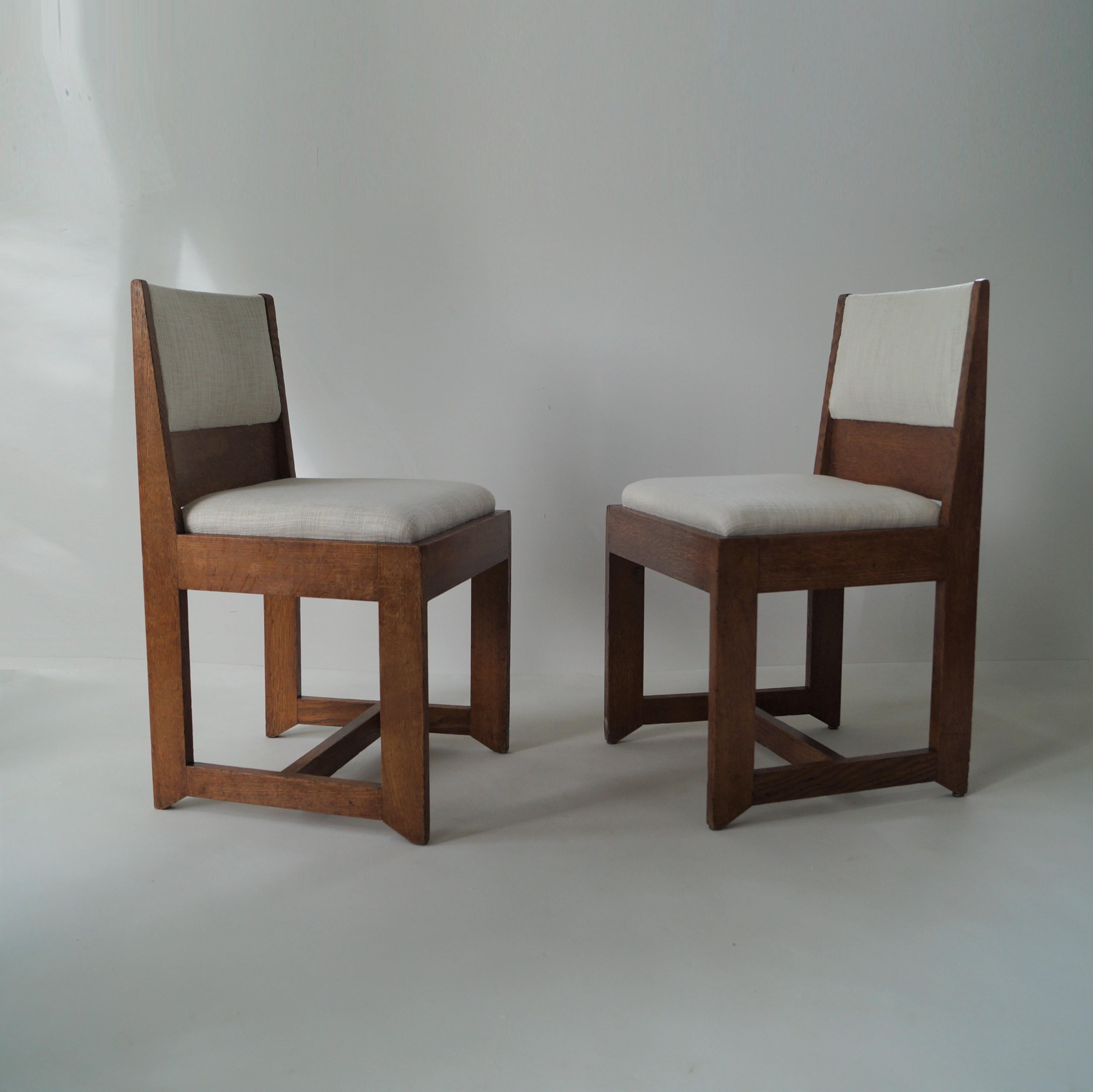 Set of dining or side chairs bij Hendrik Wouda for Pander, 1924. Modernist, rationalist and Haagse School. The chairs are reupholstered in a light fabric. 

Hendrik Wouda (1885 - 1946) was a Dutch architect, interior designer and furniture