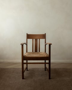 Poltrona Art Deco olandese in Oak e giunco Scuola di Amsterdam, Paesi Bassi, anni '20
