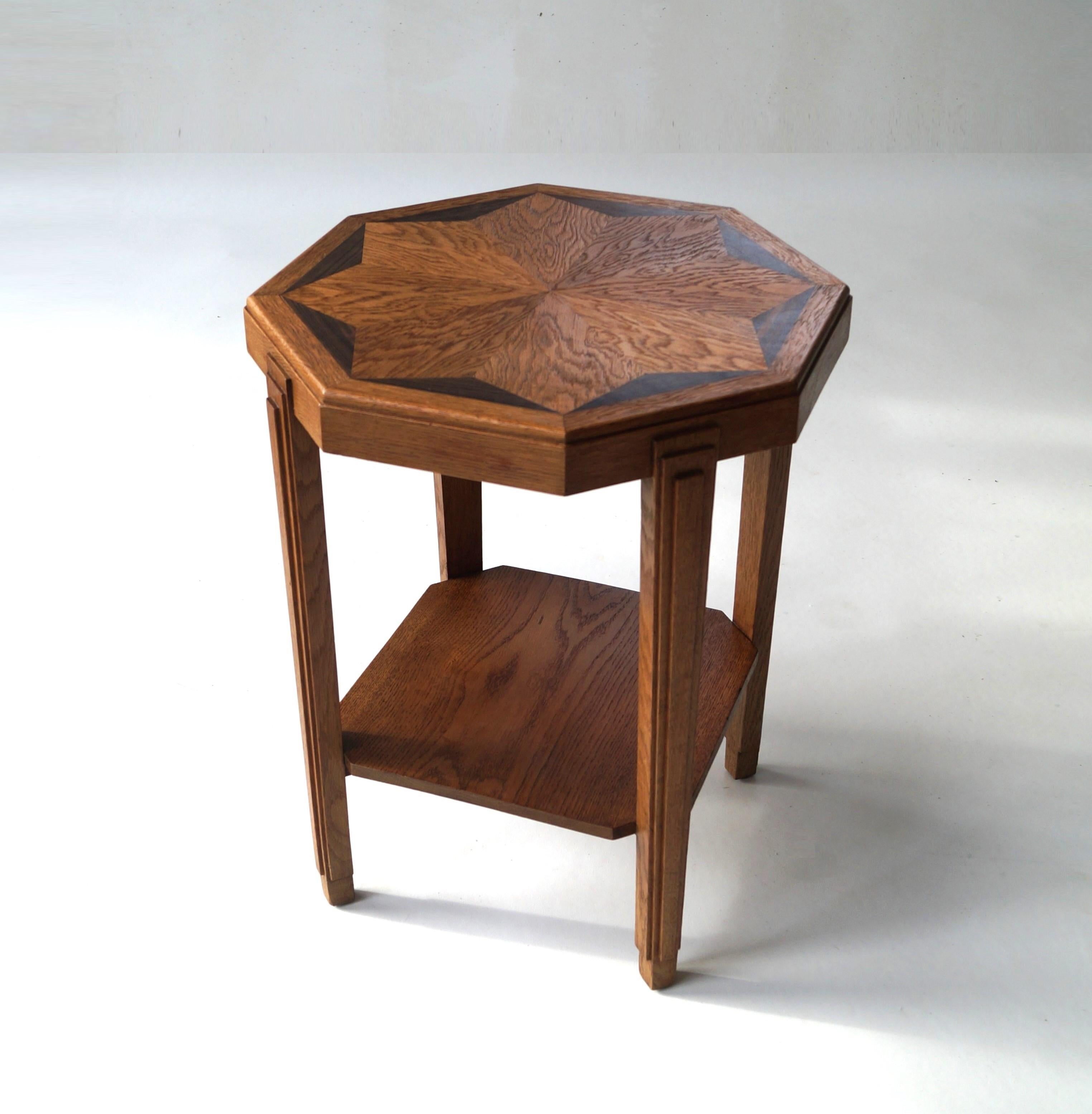 An octagonal Amsterdam School  occasional table or side table in oak and macassar inlay.
Elegant accent piece in an eclectic interior. It is a well made and sturdy little table with marvellous details. The table is in good condition, stable, the