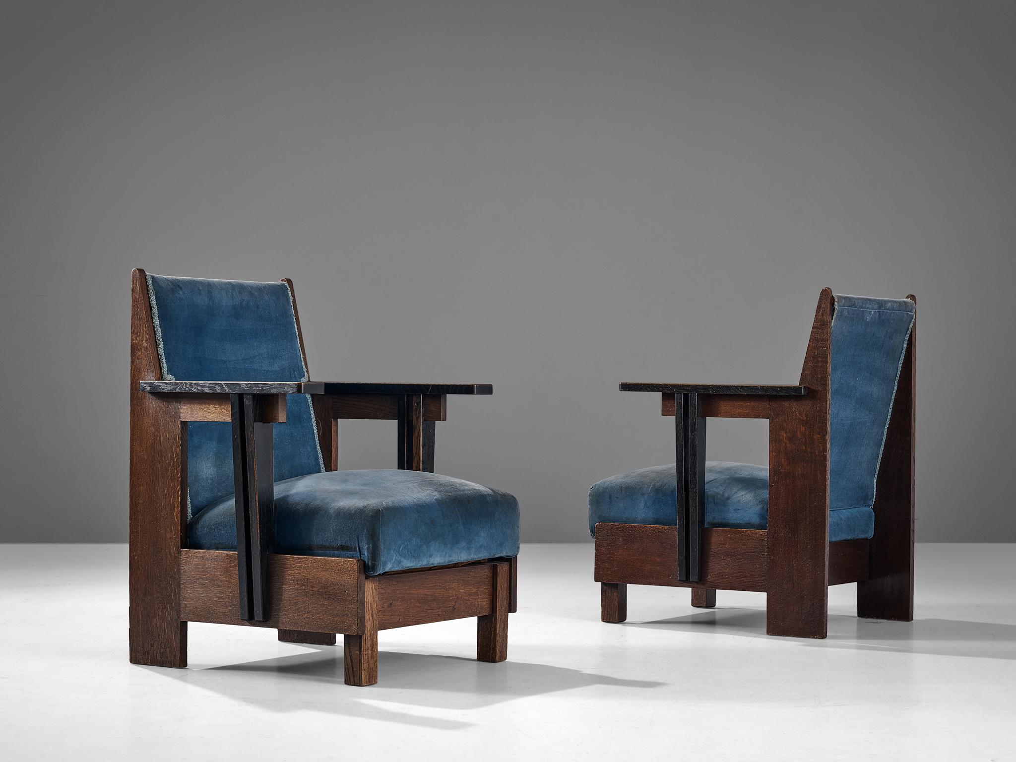 Pair of armchairs, oak, velvet, The Netherlands, 1930s

These Dutch Art Deco pair of chairs bear strong traits of the aesthetic language of the 'Hague School' from the Interbellum. During this period between two world wars, this modern style of