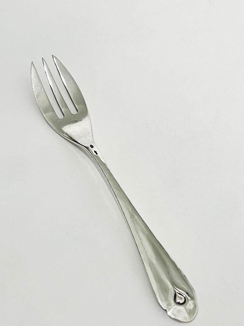 Dutch Art Deco silver cake forks, 1920s

Dutch Art Deco silver cake forks of 11 cm long by the Silver smith W. Hooijkaas, Schoonhovense silver factory, Schoonhoven (1924-1943), 
Dutch Hall mark 
