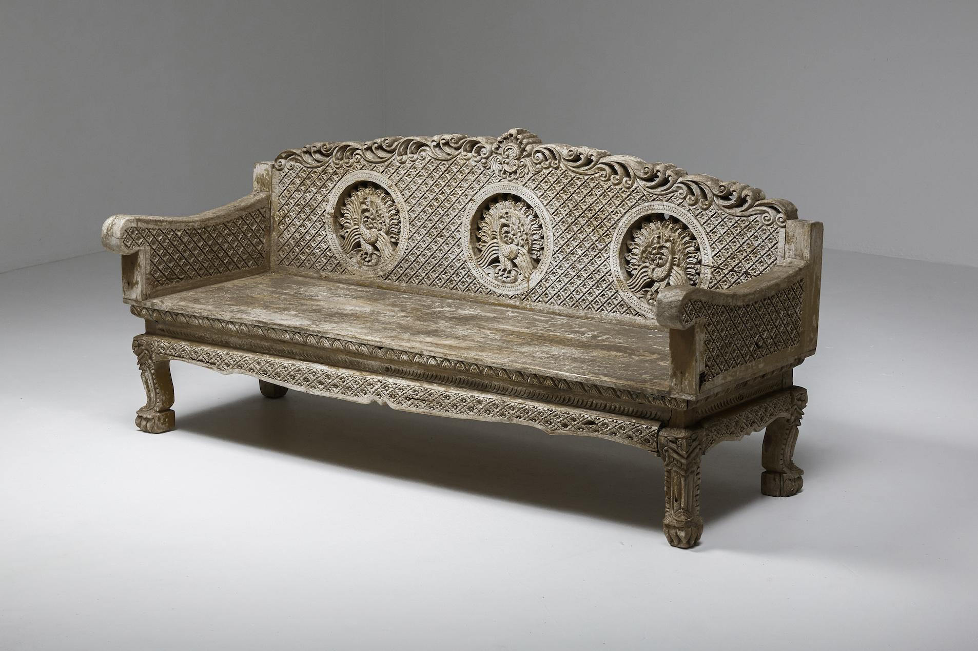 Hand Carved Wooden Bench - 1890's

Hand-carved wooden bench from France, 1890's. A true conversation piece with a unique material quality to it. The bench appears to be in stone from afar but when you touch it you are pleasantly surprised to