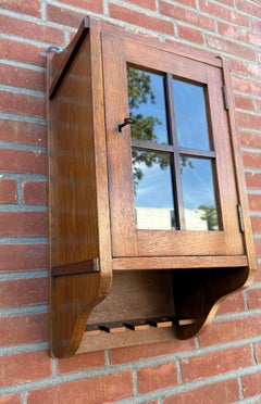 Dutch Arts & Crafts Oak Pipe Wall Hanging Cabinet with Glazed Door, circa 1910
