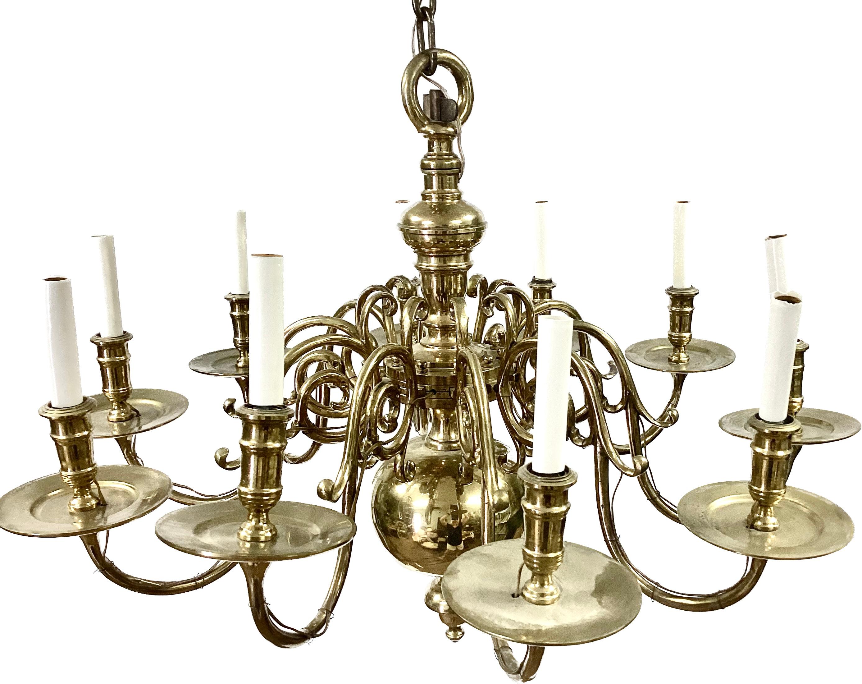 Early 20th century Dutch Baroque solid brass 10-armed chandelier with candle stems. Classic ball design with angular arms. Hard-wired with adjustable chain. Very heavy solid brass. 