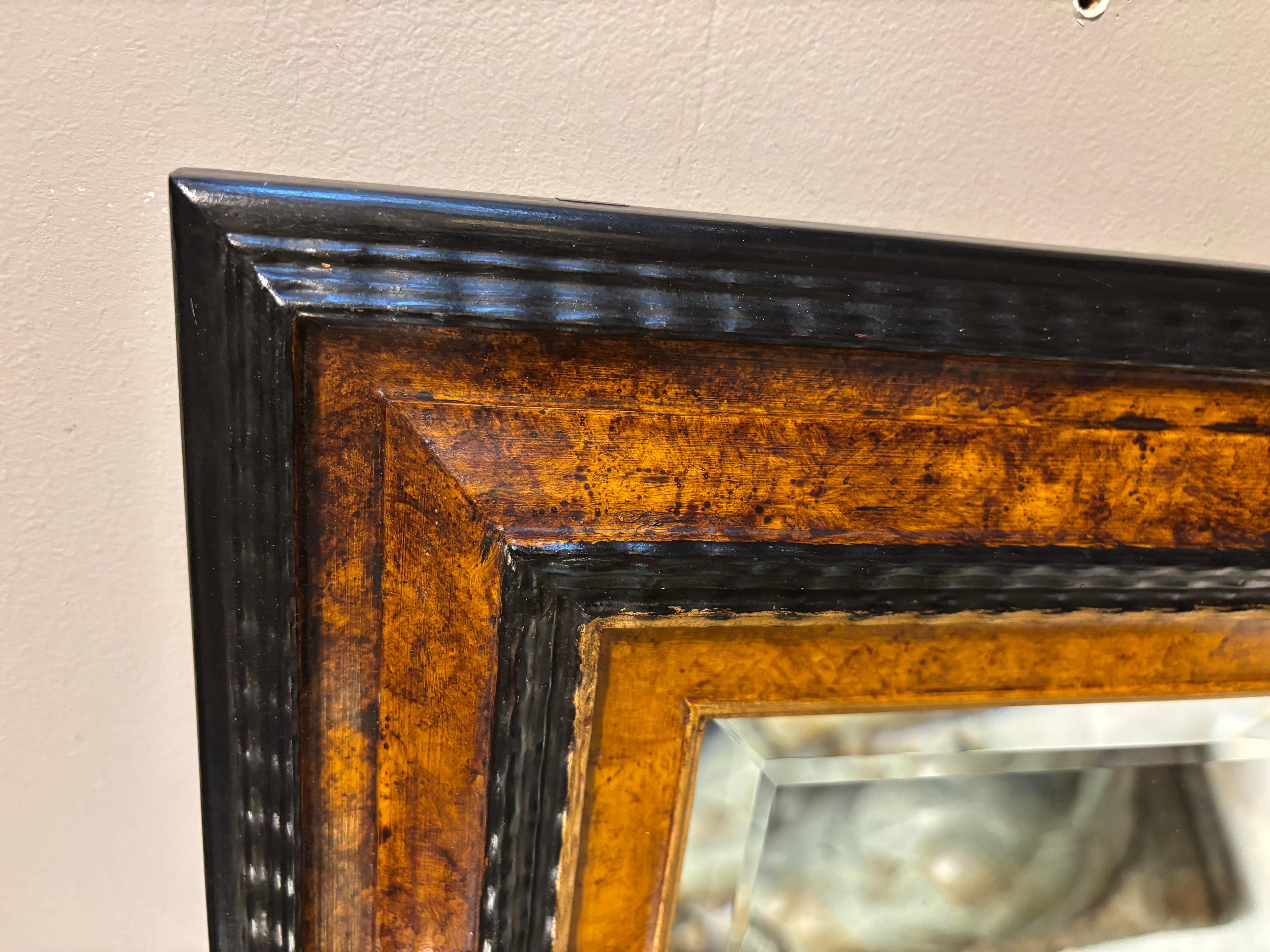 Dutch Baroque Style Ebonized Gilt Ripple Mold Framed Mirror with Beveled Glass en vente 1