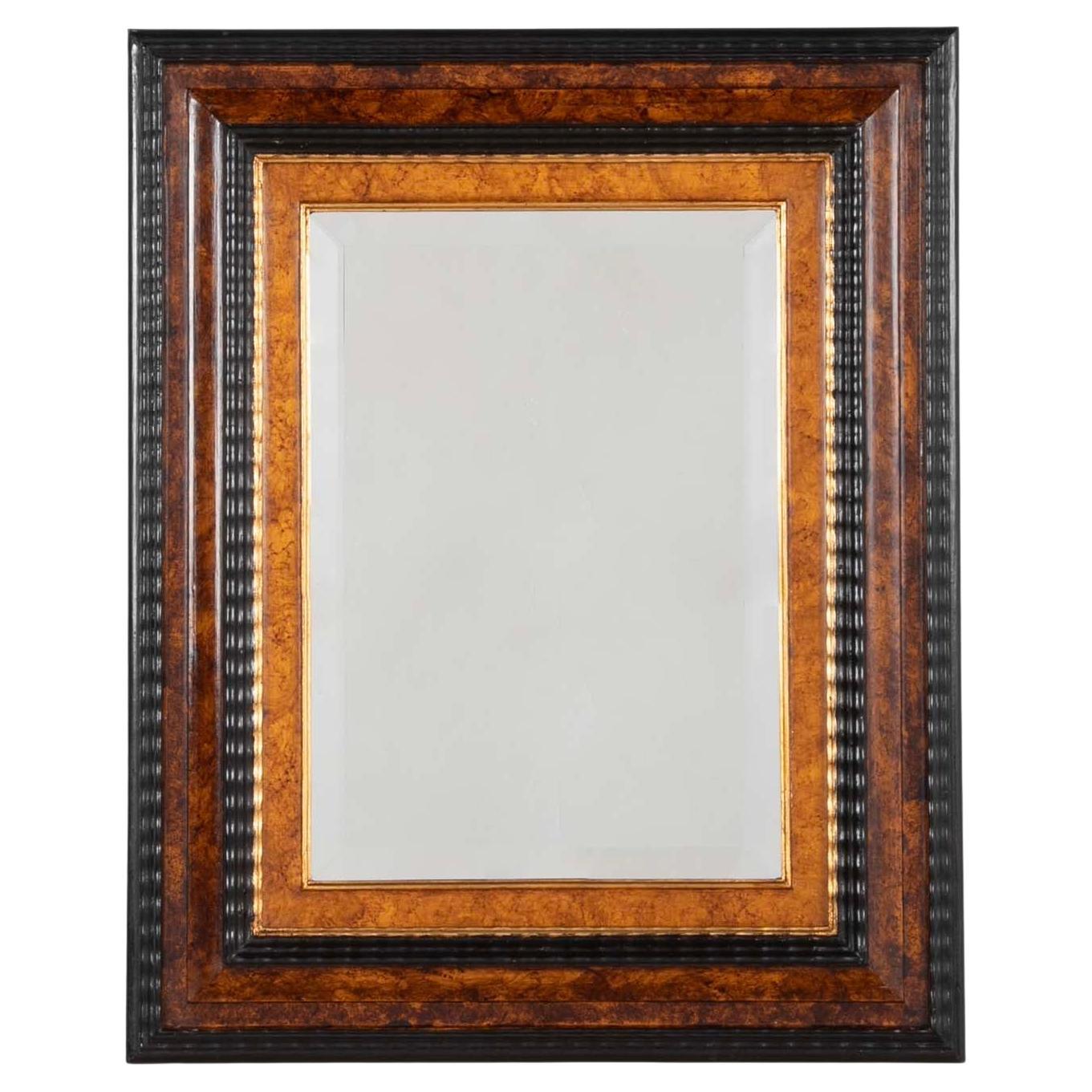 Dutch Baroque Style Ebonized Gilt Ripple Mold Framed Mirror with Beveled Glass