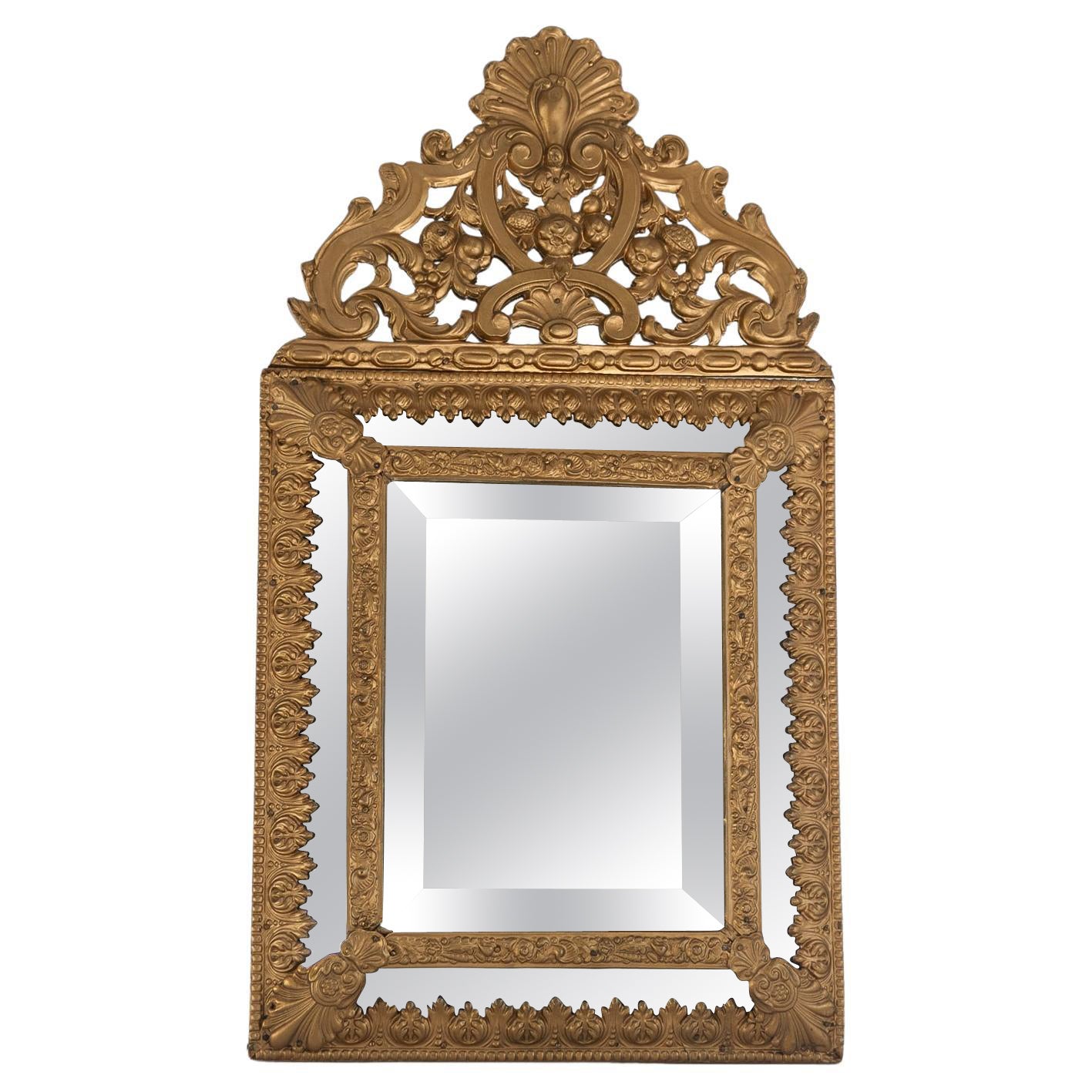Dutch Baroque Style Gilt Repoussé Cushion Mirror, late 19th century.