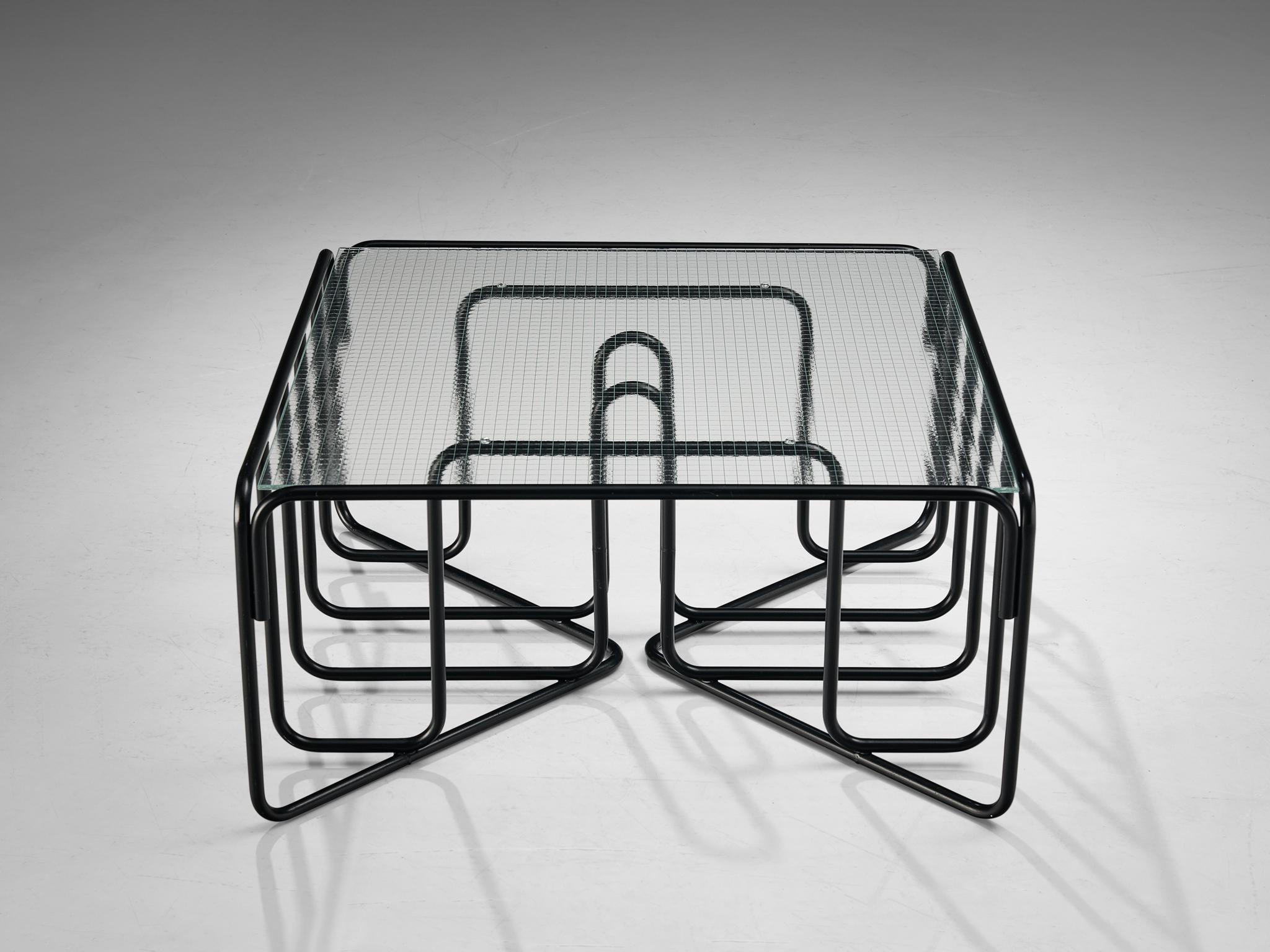 Coffee table, glass, metal, The Netherlands, 1950s.

This extraordinary coffee table is a distinctive example of Dutch Minimalist Mid-Century design. It strongly resembles designs by Gispen of the fifties. The black metal tubular base stands out