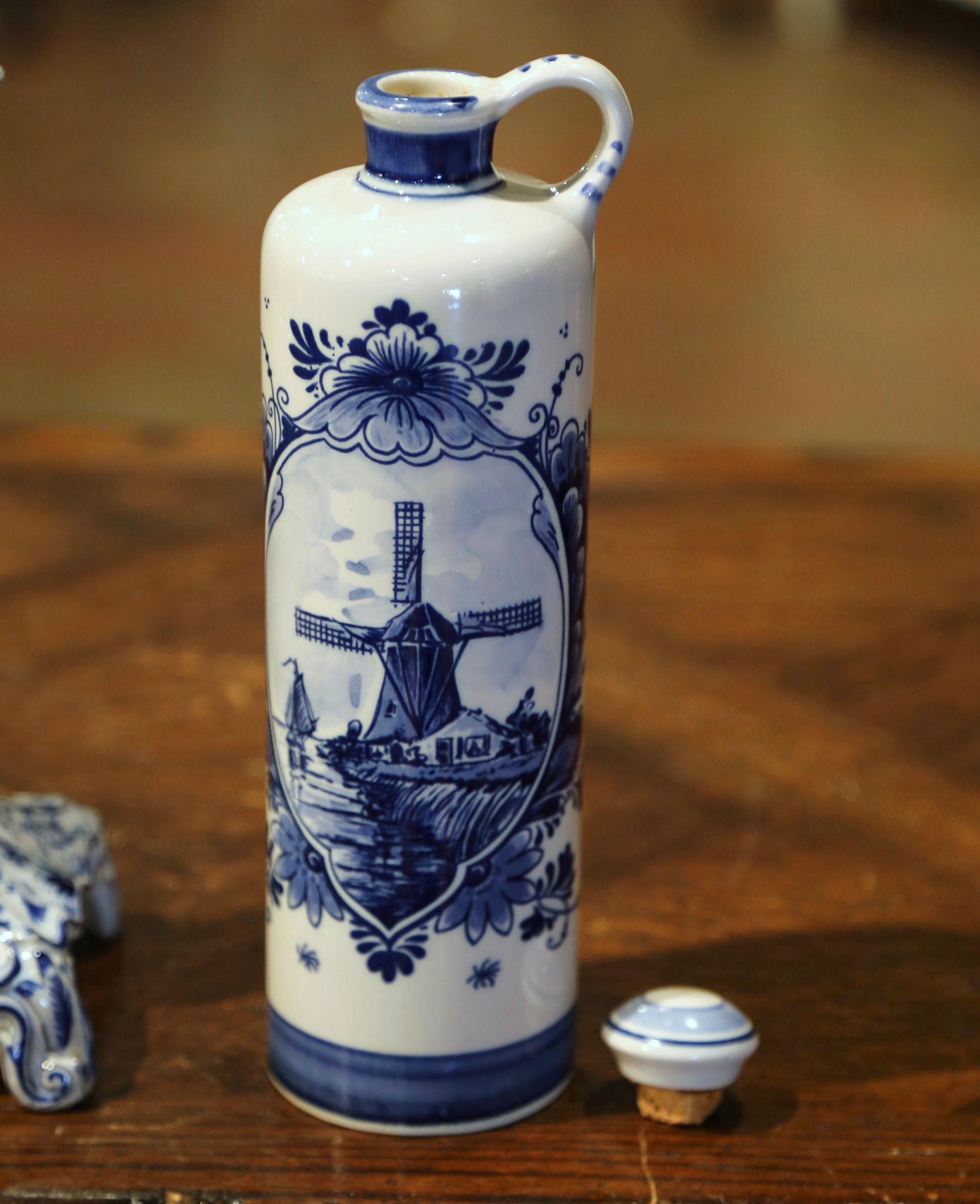 20th Century Dutch Blue and White Painted Faience Delft Olive Oil Bottle and Candle Holder For Sale