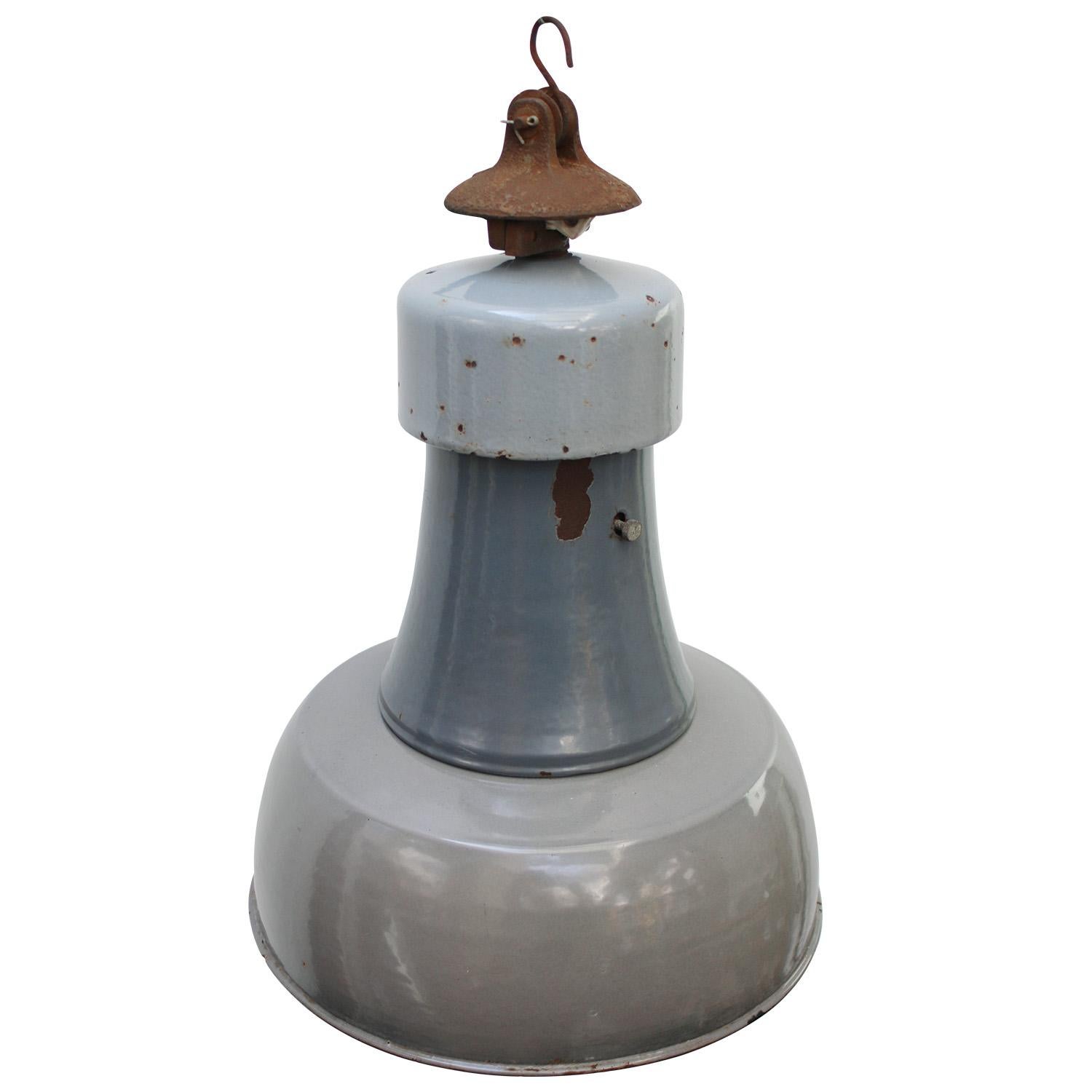 Dutch enamel industrial pendant
blue grey enamel shade, cast iron top, white inside.

Weight: 3.80 kg / 8.4 lb

Priced per individual item. All lamps have been made suitable by international standards for incandescent light bulbs, energy-efficient
