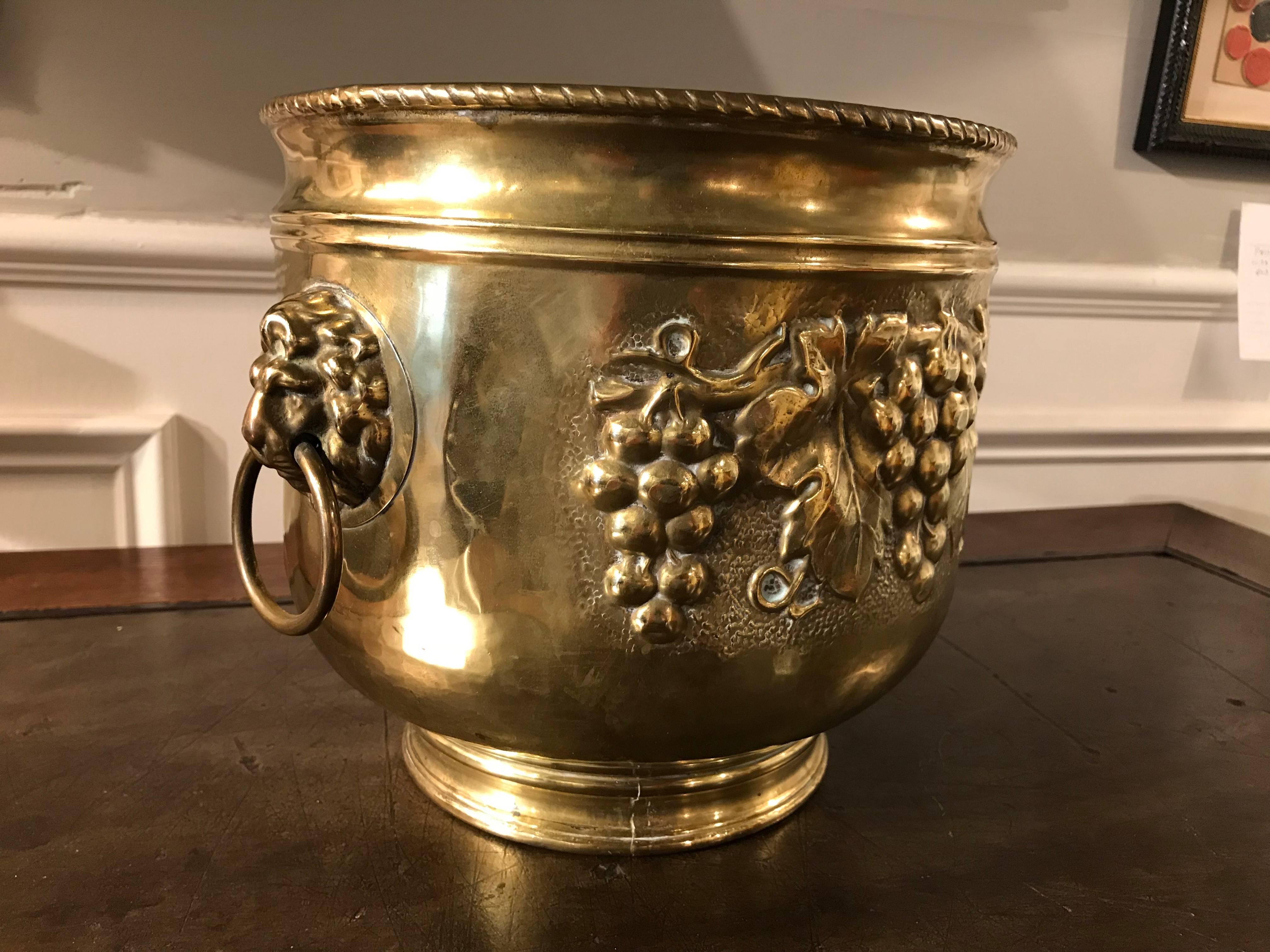 Repoussé Dutch Brass Wine Cooler with Lion Heads and Grape Vine Decoration