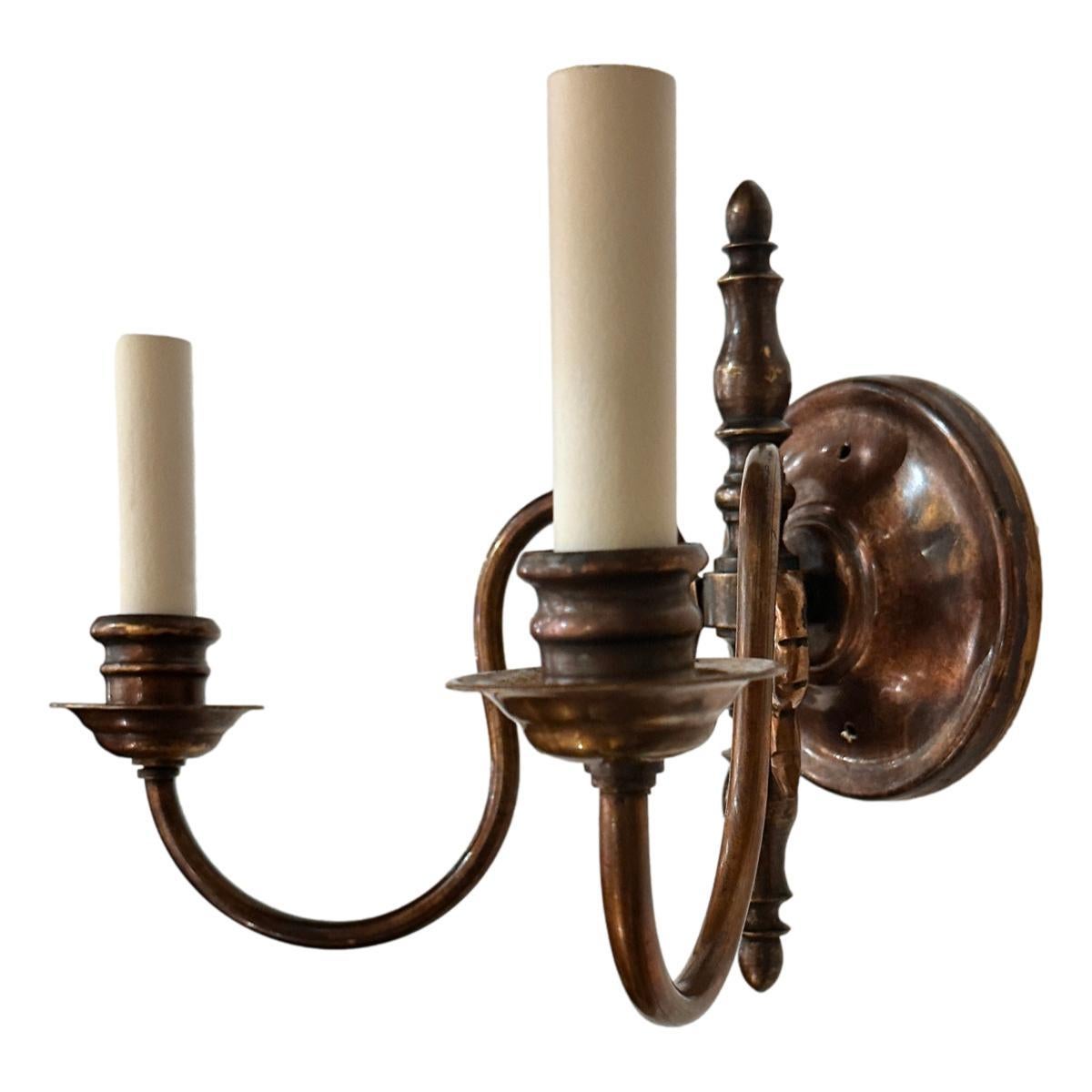 A pair of circa 1940's Dutch bronze sconces.

Measurements:
Height: 9