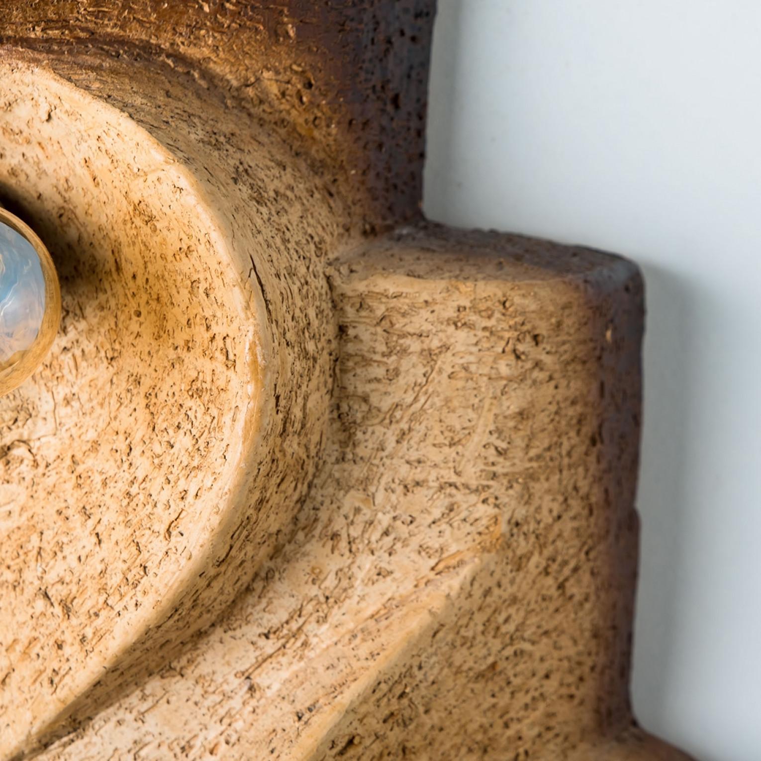 Back to nature... with this special set of 2 wall lamps. Made of ceramic and with beautiful 'earthly' organic shapes. This beautiful set comes from the 1970s, space age design. Perfect for the 70s bungalow or to combine with modern design. The