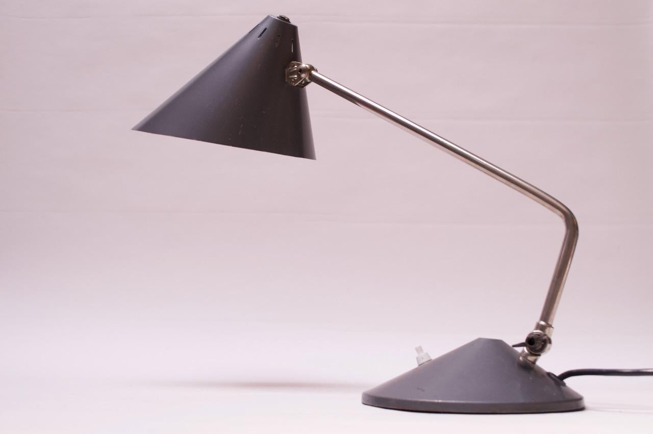 Hala (Zeist, Netherlands) adjustable task lamp in painted steel gray metal with chrome stem, circa 1960s. Features a large, flared, fully-adjustable shade with an articulating stem, which can be lowered / raised, accordingly. Good vintage shape,