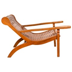 Dutch Colonial 1900s Plantation Lounge Chair with Curving Seat and Slats