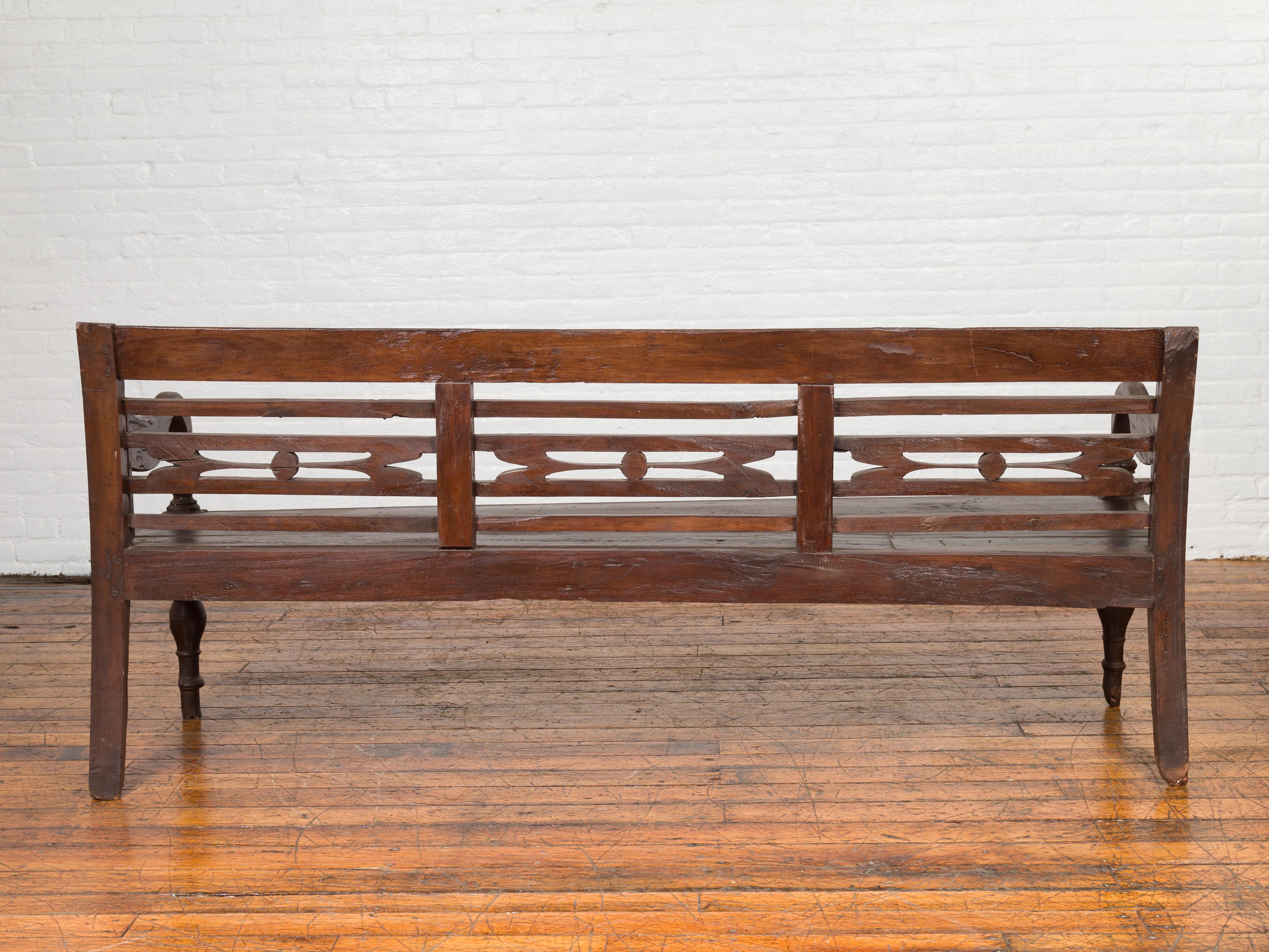 Dutch Colonial 19th Century Teak Bench with Pierced Back and Scrolling Arms 5