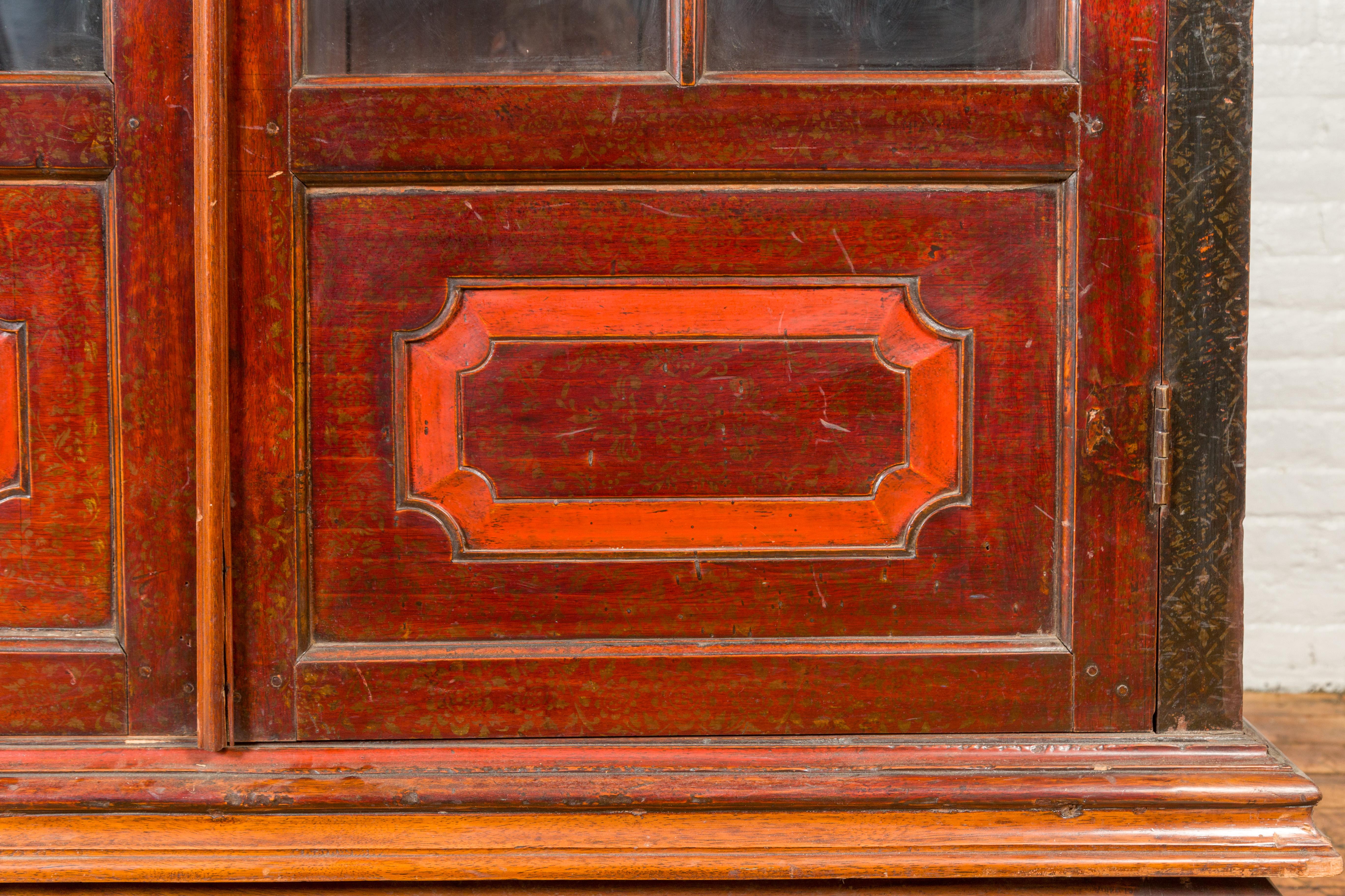 tall antique cabinet with glass doors