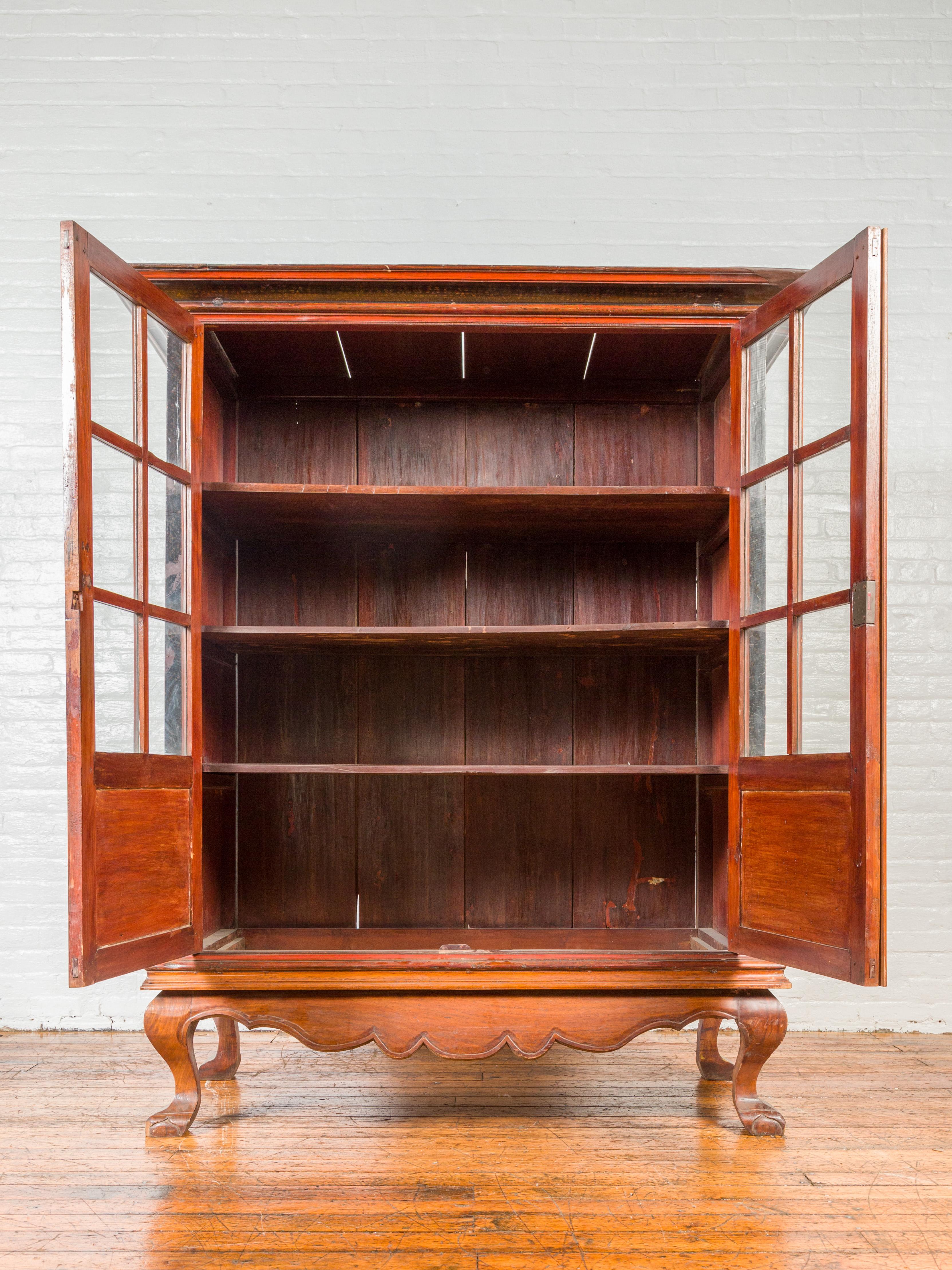 Indonesian Dutch Colonial Antique Lacquered Wood Cabinet with Glass Doors and Cabriole Legs For Sale