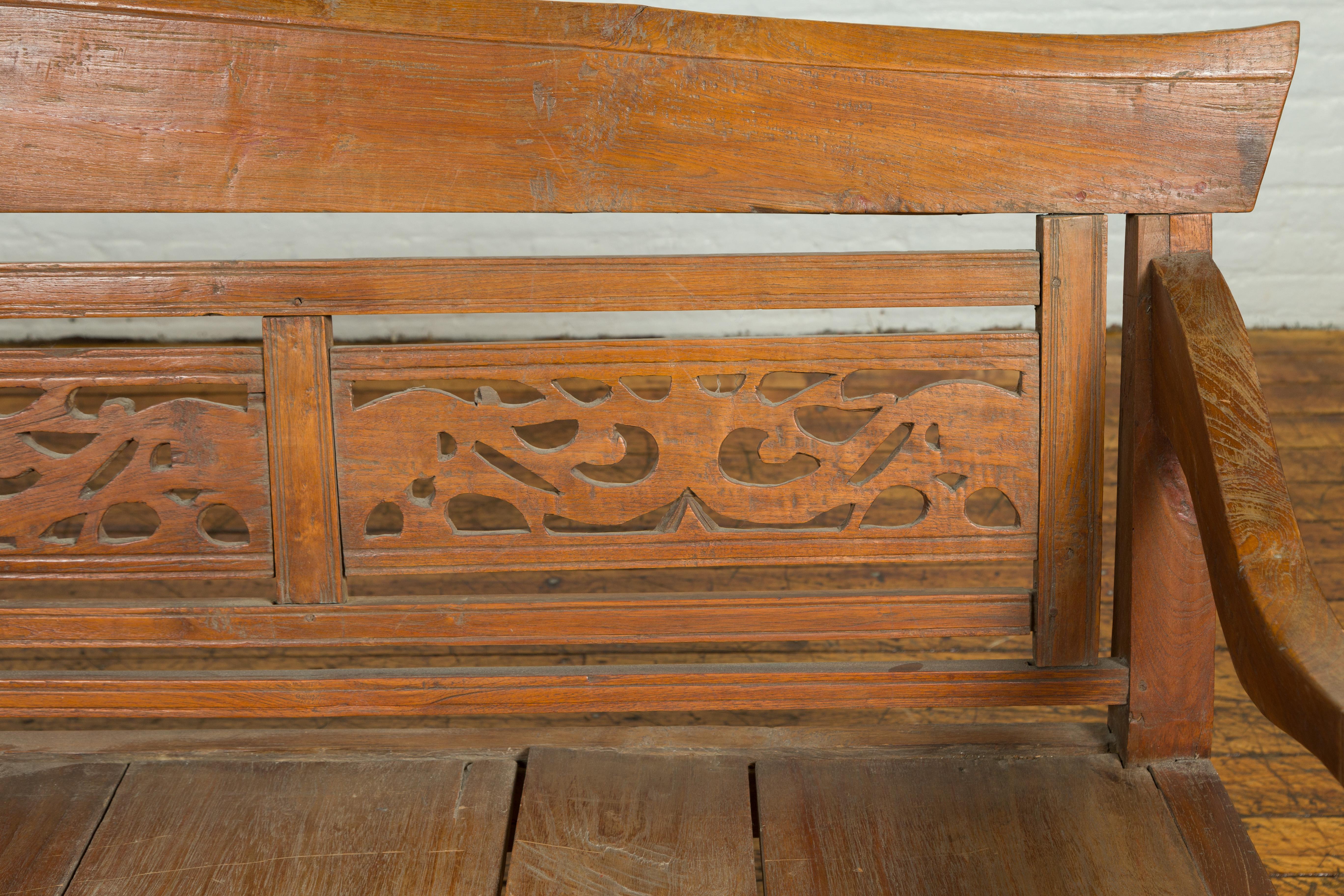 carved wooden bench